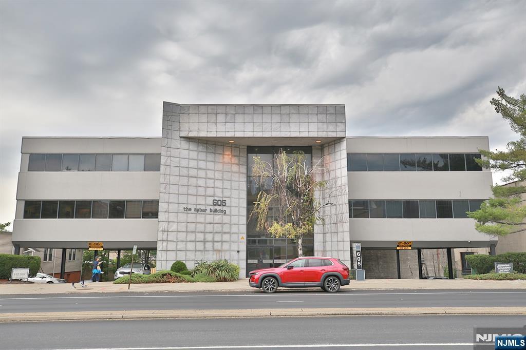 Professional office condominium ideally located on Broad Avenue in Ridgefield, just minutes from Palisades Park, one of Bergen County's most active commercial corridors. Surrounded by established medical offices, accounting firms, legal practices, financial services, and a variety of professional businesses, this location offers excellent visibility and convenience for both clients and staff. The building features elevator access, three assigned parking spaces, and a flexible floor plan suitable for medical, dental, legal, accounting, insurance, therapy, and other professional office uses. Convenient access to the George Washington Bridge, Routes 46, I-95, and the NJ Turnpike makes commuting throughout Bergen County and New York City easy. An excellent opportunity to establish your business in a well positioned, owner-occupied office location while building long-term equity.
