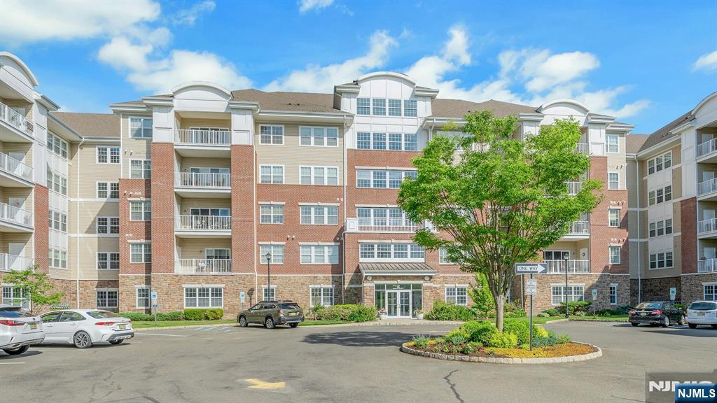 Welcome to Wanaque Reserve, one of Northern New Jersey's most sought-after active adult communities. This desirable Colfax model offers approximately 1,768 square feet of comfortable living space and presents an outstanding opportunity to customize and update to your personal taste. The spacious floor plan features 2 bedrooms, 2 full baths, a generous living room with access to a private terrace, formal dining area, and an eat-in kitchen with stainless steel appliances. The convenient laundry room is located just off the kitchen. The primary suite offers a large walk-in closet and private bath. Additional highlights include hardwood floors, abundant storage, a terrace storage closet, and one parking space #14. Offering exceptional value in sought-after Wanaque Reserve, this home presents a wonderful opportunity for buyers seeking space, convenience, and the resort-style lifestyle the community is known for. Residents enjoy an impressive array of amenities, including a clubhouse, fitness center, indoor and outdoor pools, tennis courts, and a variety of social activities. Property is being sold strictly as-is. Don't miss this opportunity to make this sought-after Colfax model your own.