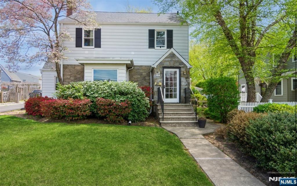 Welcome to this charming and beautifully maintained Colonial nestled in Bloomfield's desirable Oak View neighborhood. Featuring gleaming hardwood floors throughout, this home offers a stylish, updated kitchen with granite countertops and a cozy three season porch with a vaulted ceiling perfect for relaxing or entertaining.The sun drenched living room showcases a white brick wood burning fireplace, a large picture window, and a graceful arched entry leading to the formal dining room. A convenient powder room and versatile office/den complete the first floor.Set back from the street, this home sits on a spectacular, deep park like property with three patios ideal for outdoor living, entertaining, and recreation. The expansive backyard truly extends your living space.Upstairs, you'll find a spacious primary suite, two additional bedrooms, and a full bath. The third floor attic offers exciting potential for additional living space, while the full unfinished basement provides abundant storage.Additional highlights include a new roof (2021), an oversized two car garage, and a long driveway with ample parking. Enjoy proximity to shopping, schools, parks, and an easy NYC Property sold in AS IS condition Chimney and Flue no known issues, detached garage and shed in rear yard being sold in as his condition.