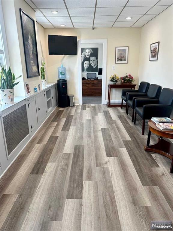Commercial office/medical space for rent on the 2nd floor in central Cliffside Park location with high pedestrian and vehicle traffic ideal for a business. Unlimited possibilities for any type of business ranging from office to medical. Prior tenant was using space as a dental office. The space consists of a large waiting room, reception area, and 5 individual office suites plus 2 smaller rooms for storage/supplies, an updated half bathroom and 2 large storage closets. Corner property with entrance on Grant Avenue with signage on both Grant Avenue and Anderson Avenue for high exposure and visibility. Plenty of street parking. Tenant responsible for all utilities except for cold water. The space has lots of potential for various commercial uses. Available immediately.