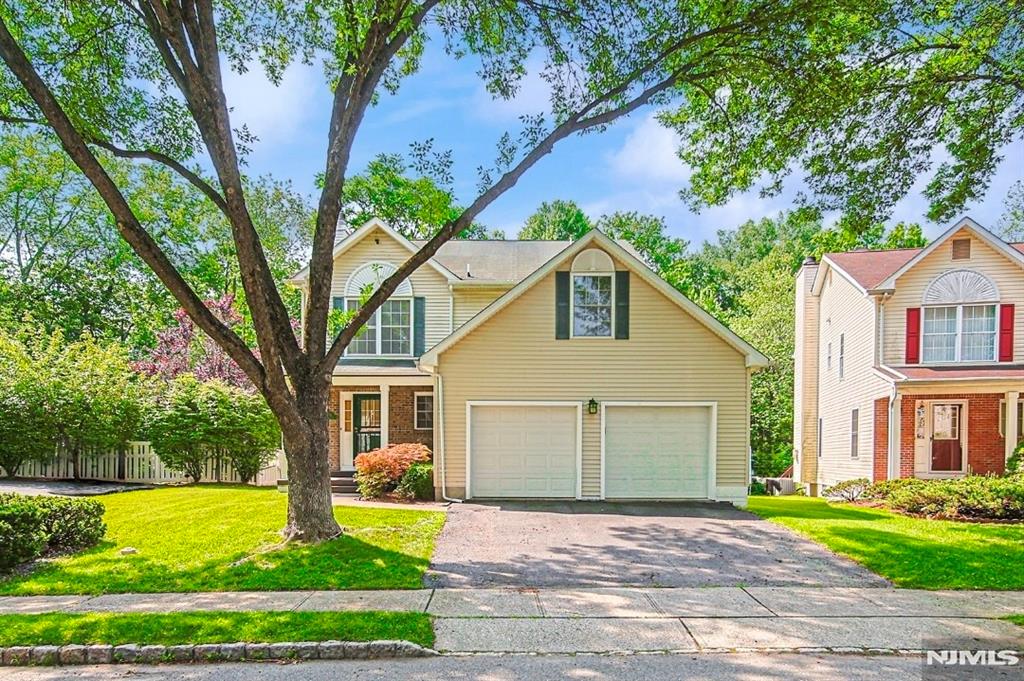 Welcome to this beautifully maintained 4-bedroom, 2.5-bath Colonial located on a quiet cul-de-sac in the highly desirable Soldier Hill neighborhood of Paramus. Built in 1998, this spacious home offers approximately 2,540 sq. ft. of comfortable living space with a bright and functional layout, generously sized bedrooms, and an inviting family room perfect for everyday living and entertaining. The private backyard provides a peaceful setting for outdoor gatherings. Conveniently located near top-rated Paramus schools, parks, shopping, dining, and major highways, this home combines comfort, convenience, and an exceptional Bergen County lifestyle. Additional Feature: A Tesla charger is already installed, providing added convenience for electric vehicle owners. **Tesla Charger, Sprinklers, Generator, Air cleaner system (air purifier), Steam sauna system (in master bed)