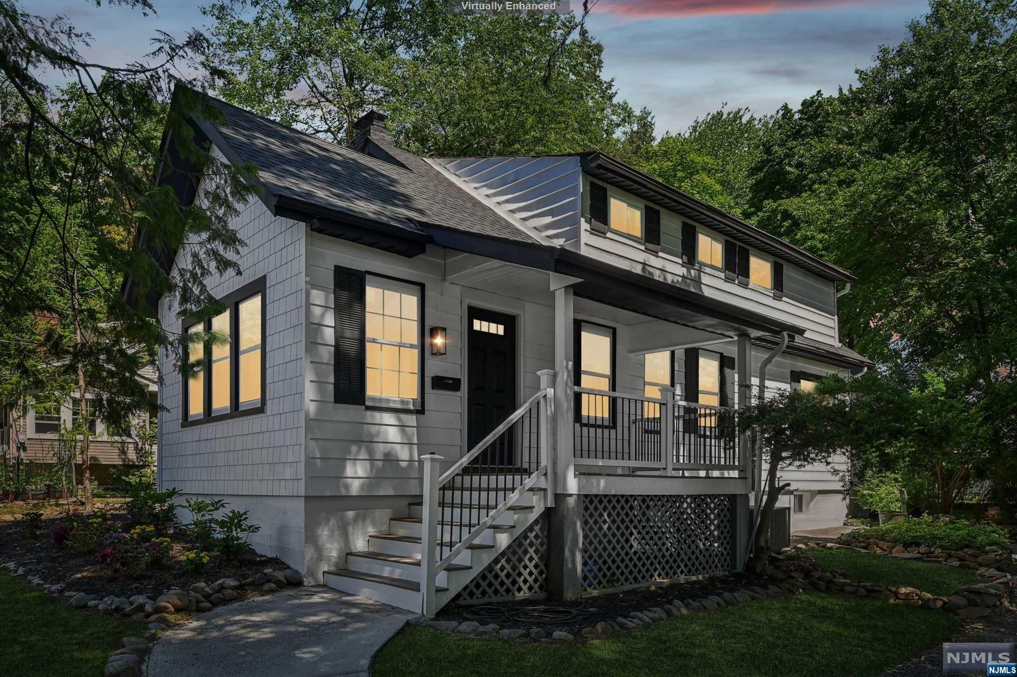 Welcome home to this beautiful custom colonial in Cedar Grove! Renovated in 2024 and completely turn-key, this perfect 4 bed, 2.1 baths property sits on over a quarter acre on a lovely tree-lined street. The First floor features family room with fireplace, living room, stunning kitchen with gorgeous center island and eat-in area, vaulted ceiling with skylights, french doors that lead to a spacious deck, full bath, and bedroom. The Second floor has a spacious primary with en suite bathroom, and two additional bedrooms that share a connected half bath. Move-in ready with the opportunity to customize your basement for added bonus space! Mature landscaping on a large, level lot with tons of trees for privacy. Awesome in-town location, close to shops, restaurants, and minutes from NYC transportation. Note: virtually staged and grass replacement in photos.