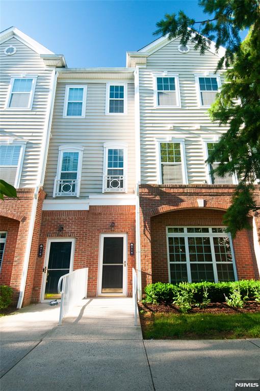 Beautiful North-Facing Montclair Model in Essex Park. This bright and inviting Montclair unit offers a terrific open floor plan filled with natural light. The first-floor features hardwood floors, a spacious living room with large windows, a dedicated dining area, a well-appointed kitchen with a breakfast counter, a full bathroom, and direct access to the garage. The second floor includes two generously sized bedrooms, including a primary suite with a walk-in closet and full bath. An additional full bathroom is conveniently located in the hallway. The property is equipped with an electric vehicle charging port, which is installed in the garage and ready to use. Located in a desirable gated community directly across from Hendricks Field Golf Course, Essex Park offers outstanding amenities including an outdoor swimming pool, clubhouse, and easy access to NYC transportation and shopping.
