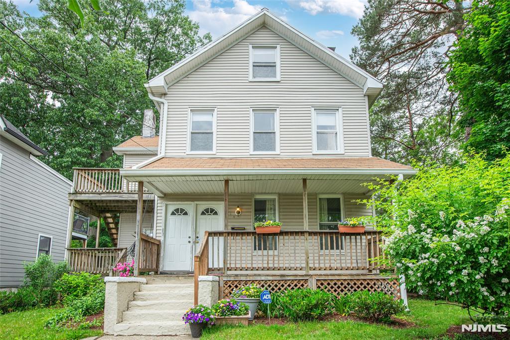 Montclair 2-family w parking for 4 cars, a spacious yard, lovely garden & CAC currently being used as a single-family, located in the Walnut Street District, recognized for its unique, village-like atmosphere & status as a premier dining/shopping destination. Boasting great curb appeal w 2 front porches & 2nd-story deck, this home is 0.2 mile from Walnut Train Station to NYC, town pool & Walnut Street's Saturday Farmer's Market. Unit 1 comprises 1st floor w 1 bedroom, a living rm w FP, a full bath, an EIK w doors to front porch & backyard w parking for 4 cars. Unit includes full, finished walk-out basement w half bath, rec rm, utilities, storage & laundry for both units, w hook-up for 2nd washer/drier, & separate entrance for Unit 2 tenants. Unit 2, reached from a separate 1st floor entrance, comprises 2nd & 3rd floors & features 2 bedrooms, an EIK, full bath, an office & a 3rd floor w storage, a walk-in closet, & skylight, that could be a fourth bedroom. Large lot has extra room for outdoor fun & gardening & possible expansion of existing structure. Storage shed & blacktop parking for 4 cars " a real benefit as many properties lack off-street parking in this area. Currently used as a 1-family, this home, has separate utilities & 2-zone CAC, & can be restored to 2-family by closing the space between entrances to Units 1 & 2. Near schools, parks, NYC transport, shops/restaurants & more. Great opportunity to own a flexible property in one of Montclair's premier neighborhoods!