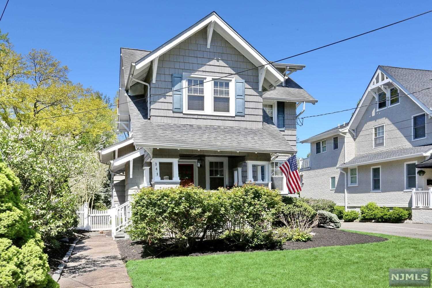 GRACIOUS 4 BEDROOM COLONIAL, (LARGER THAN IT APPEARS) CONVENIENT LOCATION CLOSE TO SCHOOLS, NYC TRANSPORTATION, SHOPPING, DINING, FIELDS, & TOWN POOL! BEAUTIFUL ARCHITECTURAL DETAILS INCLUDE HIGH CEILINGS, CHESTNUT TRIM, B-INS,FRONT & BACK STAIRCASE, H/W FLOORS (AS INSTALLED). INVITING FRONT PORCH OPENS TO THE LIVING ROOM WITH BUILT IN BOOKCASES, DINING ROOM, BUTLERS PANTRY, SPACIOUS EAT IN KITCHEN WITH SKYLIGHT,GRANITE COUNTERTOPS, STAINLESS APPLIANCES AND A LARGE PANTRY. ADJACENT TO THE KITCHEN IS A NICE SIZED DEN/OFFICE AND POWDER ROOM. THE BACK OF THE HOUSE HAS ANOTHER LARGE FAMILY ROOM WHICH SPANS THE WIDTH OF THE HOUSE AND IS THE PERFECT SPOT FOR ENTERTAINING FRIENDS AND FAMILY. THE SECOND FLOOR FEATURES THREE BEDROOMS ALL WITH HARDWOOD FLOORS AND CROWN MOLDINGS AND AN UPDATED FULL BATH(SOT). THE THIRD FLOOR INCLUDES A FOURTH BEDROOM AND STORAGE. THE DEEP REAR YARD IS FULLY FENCED WITH A PAVER PATIO,NEWER LANDSCAPING AND A DETACHED 1 CAR GARAGE.CENTRAL AIR.