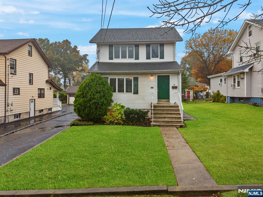 Ideally located just one block from NYC bus transportation, this charming home offers the perfect blend of convenience and comfort. Set on a flat, oversized property in a lovely, tree-lined neighborhood, this residence is ready for its next owner to make it their own. Step inside to discover sun-filled living spaces with tons of natural light throughout. Featuring 2 bedrooms and 2 full baths, this home provides great functionality with room to grow. The expansive yard is perfect for outdoor entertaining, gardening, or future expansion possibilities. Whether you're a commuter seeking easy access to NYC or someone looking for a well-maintained home in a desirable community, this property is a must-see. Bring your vision and make 58 Hillside Ave your own Teaneck treasure! Reach out to Laurie Jordan to schedule to see 201-937-5070