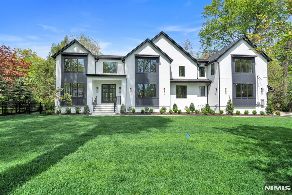 Step into a world of modern luxury with this stunning, fully completed new construction home, featuring 6 bedrooms, 6.5 baths, finished lower level, and spacious 3-car garage. The beautiful outdoor living area including covered porch, fireplace, outdoor kitchen, patio and pool. This exquisite residence is defined by its exceptional high-end finishes, open floor plan with soaring ceilings, and large windows that flood the space with natural light, creating an undeniable flow and design that will capture your heart. Nestled in the coveted town of Demarest, renowned for its award-winning schools and exclusive private golf clubs, this property offers a half-acre lot. It's ideally situated for your convenience, close to shopping, dining, and with easy access to transportation to NYC. Don't miss the chance to make this your new home, where modern luxury meets timeless elegance. Listing agent is related to seller.
