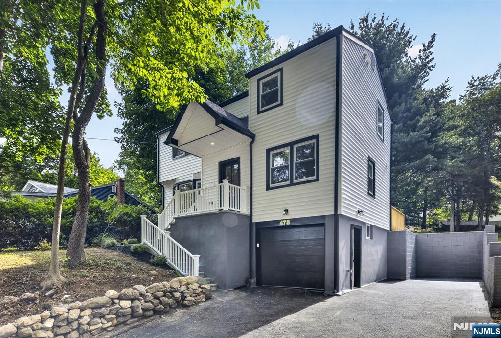 Welcome to this renovated 3-bedroom, 4-bathroom home at 478 Ramapo Valley Road in Oakland, NJ. Designed for modern living, the open-concept layout features a bright living and dining area that flows into a contemporary kitchen with sleek cabinetry, quartz countertops, stainless steel appliances, and an oversized island ideal for everyday use and entertaining. Each bedroom is well-proportioned, and all four bathrooms offer clean, modern finishes. The primary suite provides a private retreat with an en-suite bath and ample closet space. Throughout the home, updated systems and finishes create a truly move-in-ready experience. Located in Oakland, this property offers convenient access to local parks, shopping, dining, schools, and major commuting routes, providing a balanced lifestyle with both neighborhood amenities and regional connectivity. This turnkey home is a strong opportunity in a desirable Bergen County community.