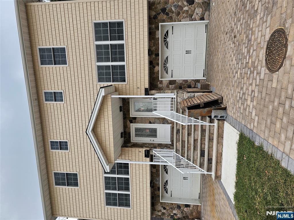 Newly Built Modern Duplex, $729,900 per side features EIK w/island, hi-hat lighting, granite countertops, all Stainless-steel appliances, sliding door to deck 14' x 12', open concept living and dining room. Central a/c, heating w/2 zones, mini-split system on ground level for added heating and cooling. 3 spacious bedrooms, each with double closets, overhead lighting, master bath in master bedroom, 3.5 wide oak wood floor. Anderson tilt windows/screens, colonial-style wide trim casing. Oak hardwood floors throughout. Finished ground level family room, laminate flooring, rear yard and oversized garage access, washer/dryer hook-ups. Each unit includes separate utilities. Conveniently located within walking distance of train, bus and shopping. P