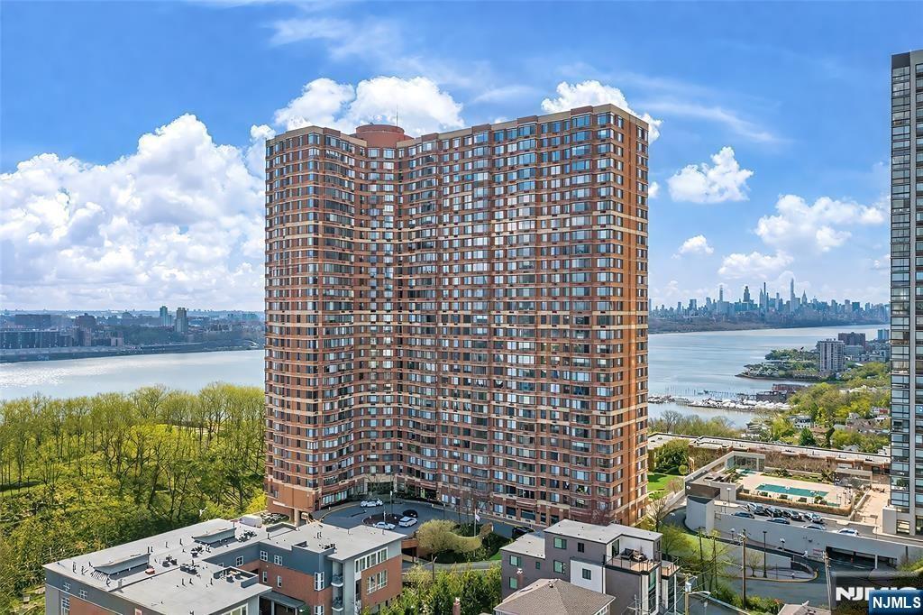 Welcome to luxury high-rise living at 100 Old Palisade Road in the heart of Fort Lee. Perched on the 27th floor, this beautifully renovated 1-bedroom, 1-bath residence offers breathtaking panoramic views and an abundance of natural sunlight throughout the day. The thoughtfully updated interior combines modern finishes with comfort and functionality, creating the perfect move-in-ready home. Enjoy the convenience of garage parking, easy access to NYC transportation, and an unbeatable location close to shopping, dining, parks, and major highways. Whether you're relaxing while taking in the skyline views or commuting effortlessly into Manhattan, this residence delivers the ideal blend of luxury, convenience, and lifestyle in one of Fort Leeâ€™s most desirable communities.