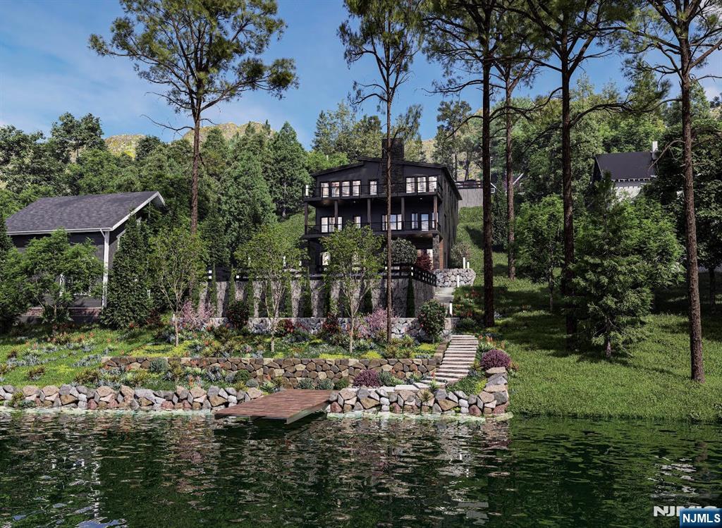 A rare opportunity to own a brand new, architecturally striking lakefront home in the highly sought-after Erskine Lakes community of Ringwood. Thoughtfully designed to embrace the natural topography, this custom residence offers three levels of finished living space (approx 3700 sq ft), expansive decking, and stunning lake views from nearly every room. The main living level features a bright, open-concept layout with a designer kitchen, oversized island, dining area, and spacious family room. Walls of glass and sliding doors lead to a full-width deck perfect for entertaining or simply taking in the peaceful surroundings. A primary suite on this level provides convenience and privacy, complete with a spa-like bath and generous closet space. The middle level offers two additional bedrooms and flexible living space, ideal for guests, home office, or recreation, all designed with modern flow and functionality in mind. The walkout lower level is a true standout, featuring exceptional ceiling height specifically designed to accommodate a golf simulator, along with ample space for a media room, gym, or game area. Direct access to outdoor terraces and professionally designed landscaping enhances the indoor-outdoor lifestyle. Enjoy all that Erskine Lake has to offer, including year round social events, beach club, access to beaches, boating, and a vibrant lake community all just under an hour from NYC. To be built- bring your vision and make this exceptional lakefront home your own.