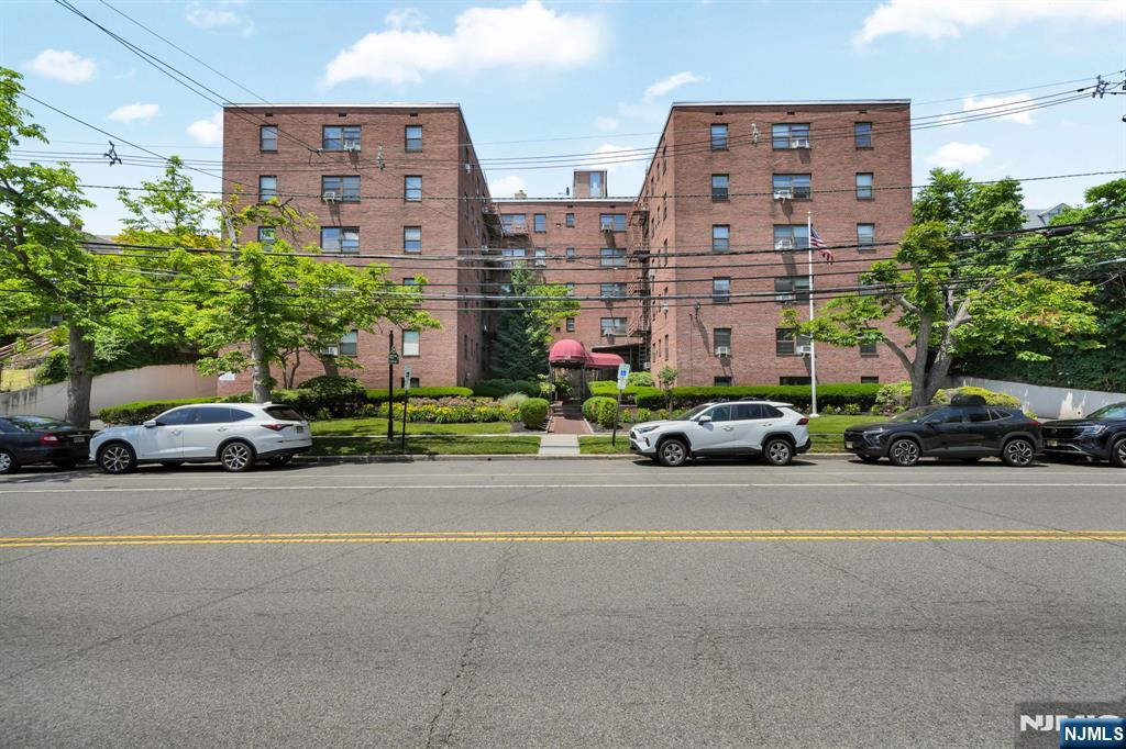 Spacious and sun filled 2 bedroom corner condo located on the fourth floor. This bright unit features a large living and dining room combo, hardwood floors, and abundant natural light throughout. The building is elevator equipped and offers a full basement with laundry facilities, bike rack and additional storage. Garage parking maybe available, application required. A true commuter's dream with an NYC bus stop directly in front of the building, just two blocks from the train station, and easy access to major highways. Enjoy being within walking distance to Rutherford shops and dining.