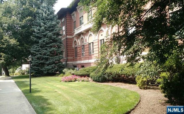 Spacious 2 bedroom condo in Tenafly's most convenient location, very close to everything downtown has to offer. Classic boutique & well managed building w/elevator & live-in super. Large windows provide lot's of natural sunlight & the layout is really very inviting. Other features include: open kitchen with granite counter-tops & dishwasher, hardwood floors throughout, washer/dryer in unit, lots of closet space, additional small room that can be used as a mini office/den or just as an extra walk-in storage room, individual central a/c & heat system fully controlled by tenant, assigned parking, assigned basement-storage-bin. Walk to restaurants, movie theater, post office, schools, parks, NYC transportation etc. You couldn't ask for a better location! Min 1-year lease required. Apartment is 1 floor up from main front entrance or 2 floors up from the ground-level rear entrance. Elevator building. No pets. No smoking. Pictures are from a few years ago. 2 outdoor parking spots, 1 assigned.