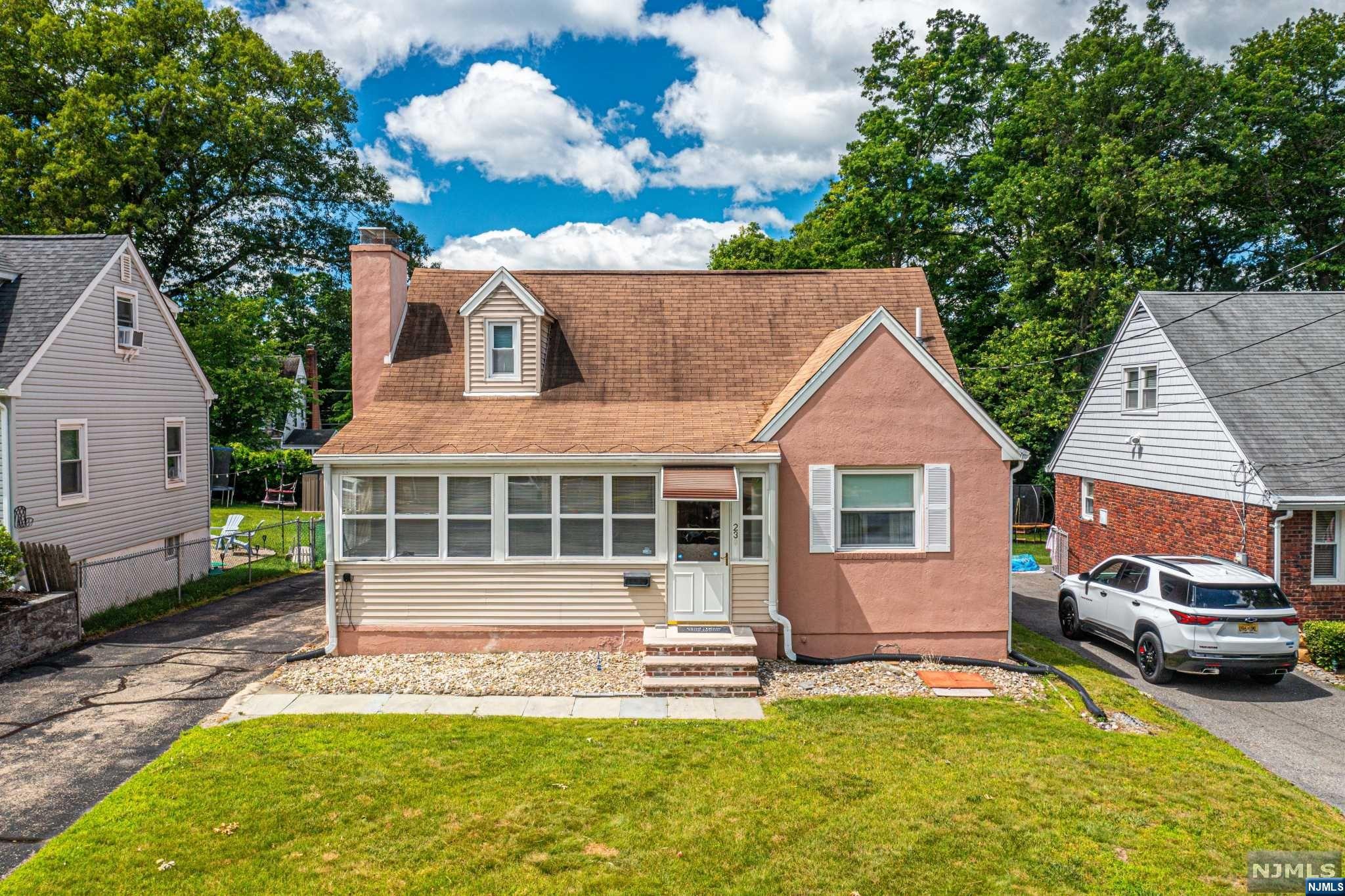 True Pride of ownership in this custom home! Spectacular expanded Cape nestled on a level lot in lovely neighborhood. Character and warmth of the 1928 Cape Cod design. Flowing, practical layout great for entertaining. An enclosed porch welcomes you on your way in! Large and spacious rooms throughout. Functional kitchen offers counter/cabinet space. Opens to Formal dining & living room with wood burning brick faced fireplace. Two 1st floor bedrooms & full bath. Upstairs, Big Primary Suite upstairs w/the second Full Bath and walk in closet. Full bonus BSMT- storage, workshop yet offers tons of potential to finish. Level backyard plus patio & lawn. Perfect for Entertaining & Relaxation! Tons of storage! Detached 2 car garage! Just a short walk from Friendship Park with its 44 acre trails and Bogue Pond with fishing and playground. Easy access to major highways. This home has been lovingly cared for... Lots of important upgrades & features.