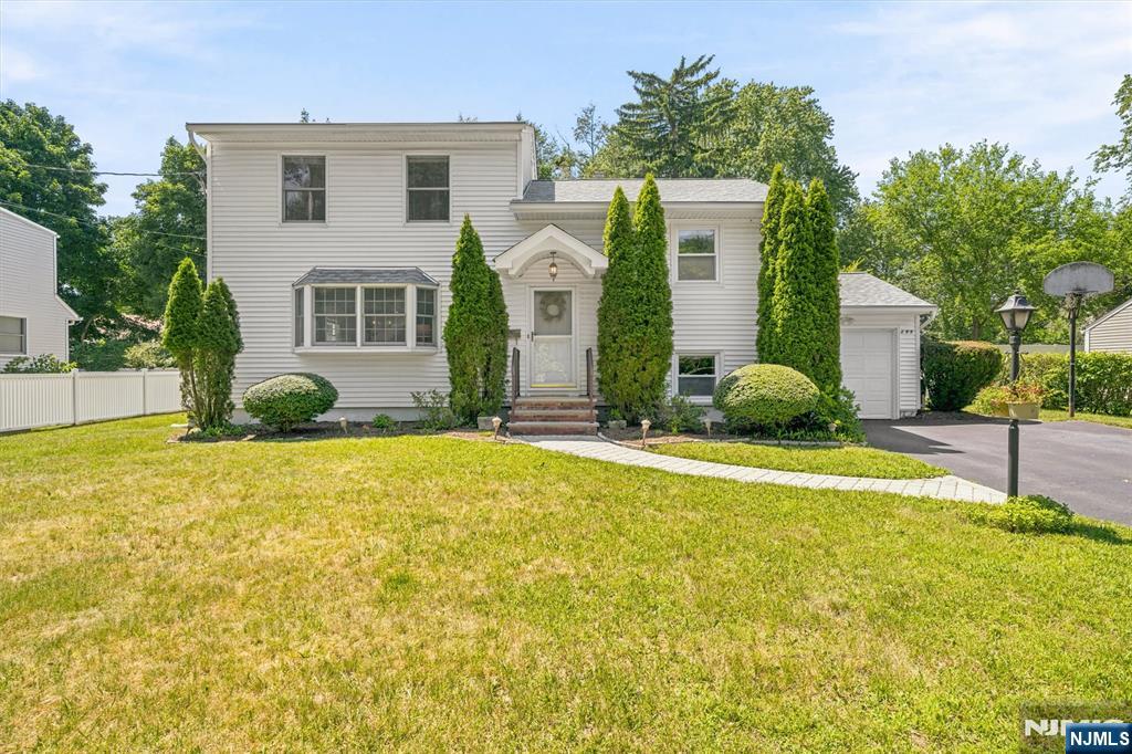 Located in a highly desirable neighborhood in Ramsey, this 2500 sq ft, 4-bedroom, 2.5-bath home offers a perfect blend of space, comfort, and everyday functionality. The first floor features a well-designed and inviting layout, including a kitchen with granite countertops and stainless steel appliances, a formal living room and dining room with hardwood floors, and a spacious family room with cathedral ceilings and a gas fireplace. Sliders from the family room open to a paver patio and a private, fenced-in backyard, creating an effortless indoor-outdoor flow ideal for both everyday living and entertaining. A convenient half bath completes the main level. Upstairs, the primary bedroom features a full bath ensuite, while three additional generously sized bedrooms share a full bathroom, offering flexibility for family, guests, or home office use. The lower level extends the living space even further, providing the perfect setting for recreation, entertaining, or relaxing by the wood-burning fireplace. An additional highlight is the whole-house generator, adding peace of mind. Donâ€™t miss this opportunity to own a beautifully maintained home in one of Ramseyâ€™s most sought-after neighborhoods. WANT MORE INFO? CONTACT LISTING AGENT NICOLE MINETTI @ 201-388-0077//nicole@minettidennisgroup.com
