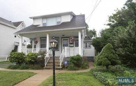 UPDATED PLUS LOCATION LOCATION!. Seconds from downtown..PRIVATE REAR,SIDE&FRONT DOOR ENTRIES."RARE FIND". CHARMING LEMONADE FRONT PORCH. 1st Fl:Offers Cheerfully Bright,Spacious&Cozy LR&DR w/bay window,adding more Natural Sunlight&Floor Space.Great for Entertaining! UPDATED,large/open eat-in Kit."Gas" Range,Hardwd Floors; Great Closet Space; King sized BR. Updated Bath & 2 Lrge BR's.Laundry/Mudrm area @rear door entrance. Private W&D in-suite(Hard to find).Partially finished bsmt, has private bonus multi purpose rm.Great for home office or rec.room. 1/2 bath, plus work and storage area. 2nd Fl: offers private front entrance,LR w/large storage closet,Eat in Kitchen,3 nice sized BR's. Oversized 2 car garage &carport,+ wide driveway that can fit 6 cars. Use of Lovely Large Yard and Patio. Incredible opportunity to Owner Occupy or Invest in this charming two family home in the Heart of Hawthorne."Brand new Driveway". Quiet Street Setting. WELCOME HOME! owner is NJ referal agent