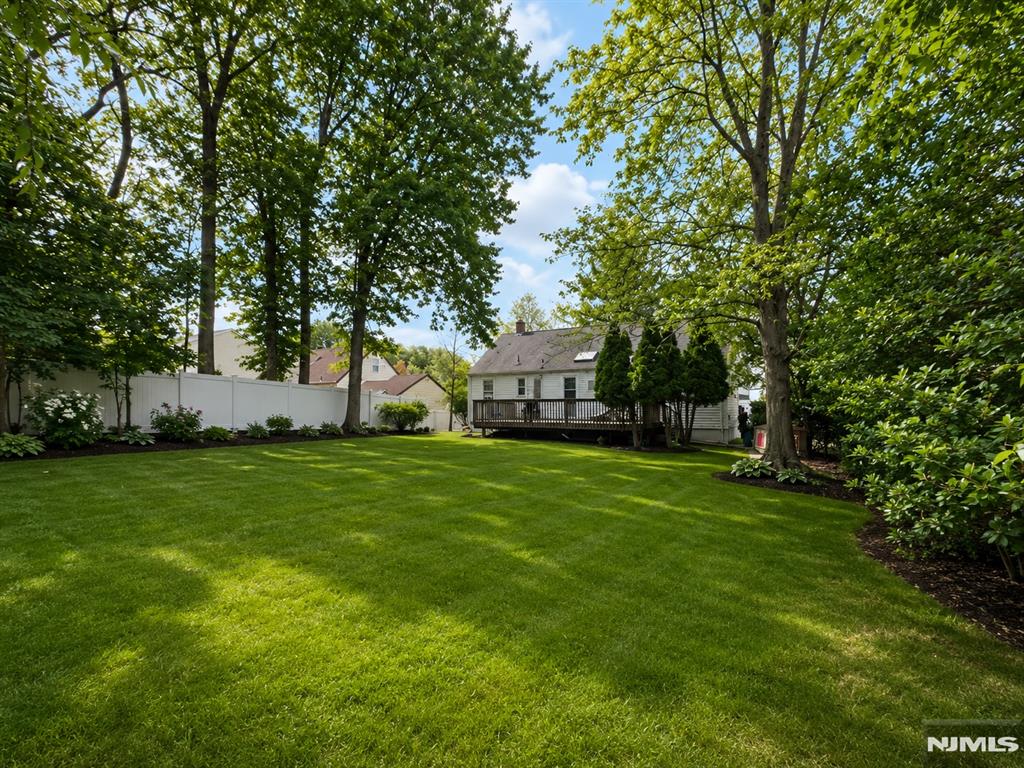 Endless possibilities await on this nearly 12,000 square foot lot in prime New Milford location. The existing home features four bedrooms and three full bathrooms, offering the opportunity to renovate and customize to your taste, or build the dream home
