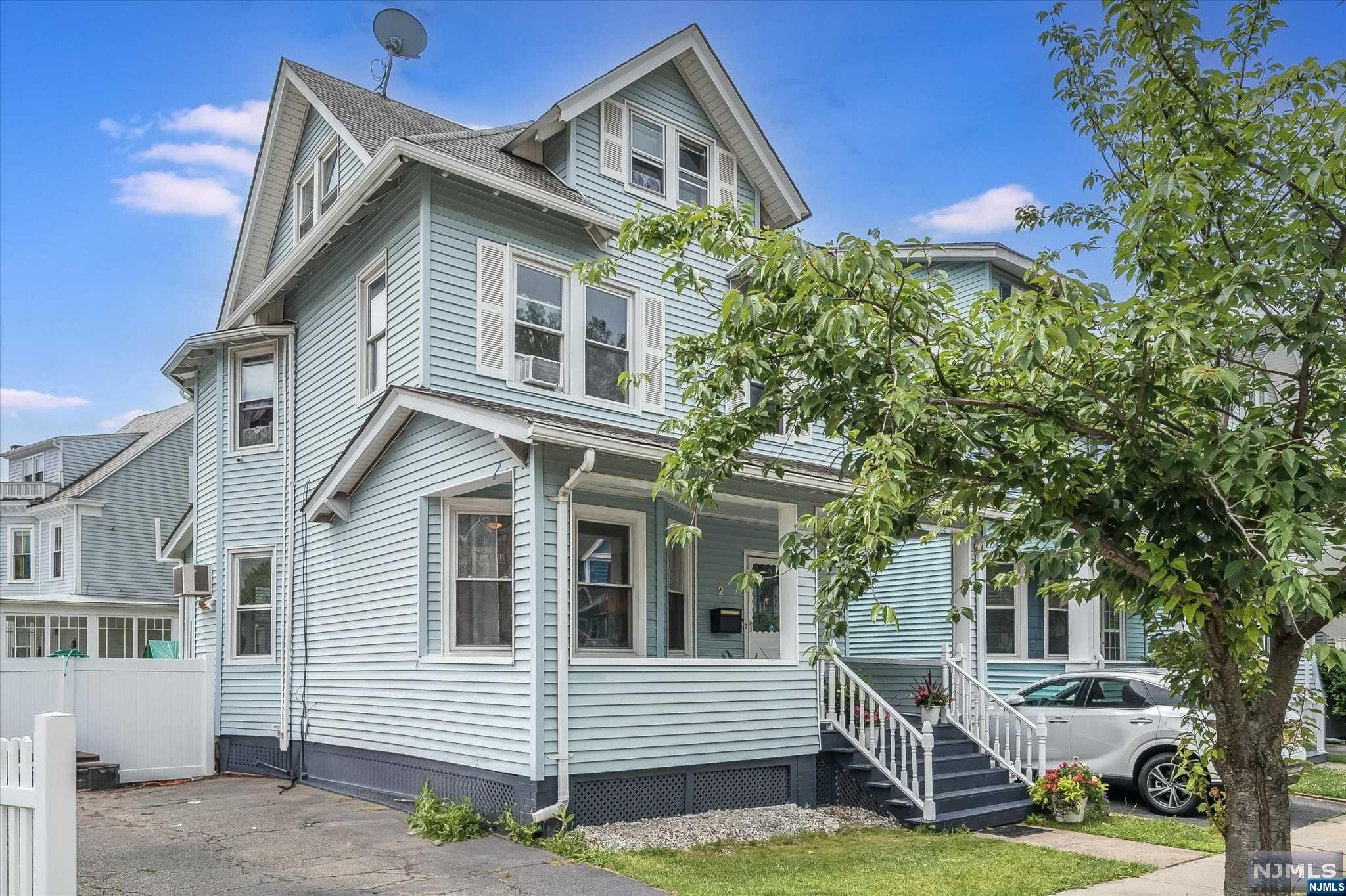 Pristine 5 bedroom 2.5 bath Colonial is located in the historic district of Glen Ridge with the NY train, town pool & Bloomfield Ave shopping & dining just down the ST. Wide open front porch is a welcome entrance to the foyer with a generous coat closet & open to sunny living room with high ceilings, large windows, moldings & hardwood floors. The formal dining room features a fireplace (decorative), bay windows & cozy window seat. Updated kitchen has plenty of white cabinetry, new granite counters, wood floors & a pantry closet. Finally, a coveted powder room completes the first floor. Upstairs there are 3 BRs & a fresh full bath with an additional 2 BRs on the third floor. The basement offers an additional brand new full bath, laundry, new water heater, boiler, french drains and sump pump plus access to the backyard. The level yard is fully fenced & accessed through french doors from the kitchen. Top-rated schools, easy access to Montclair's vibrant downtown & quick NY commute.