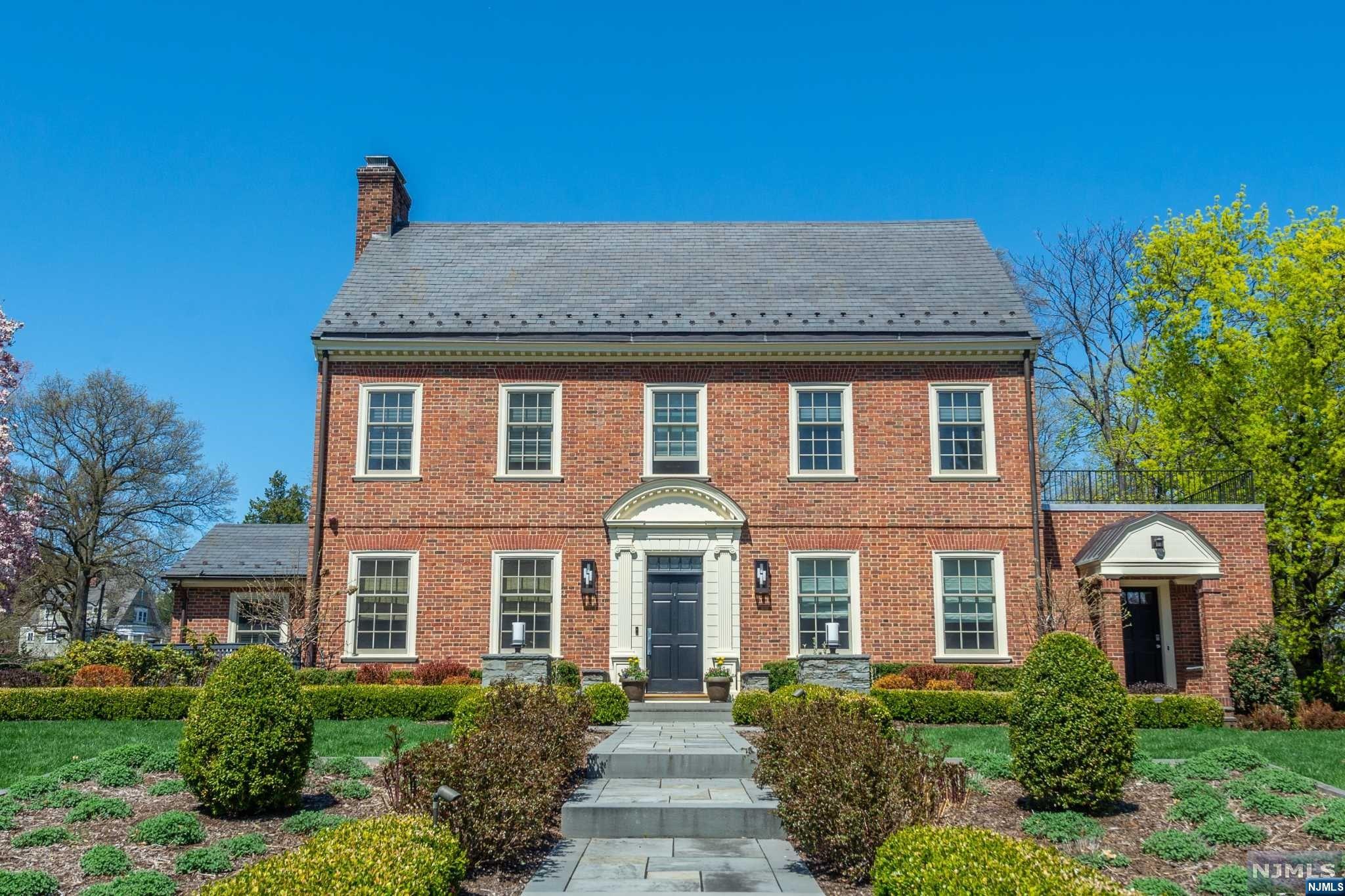 This iconic Francis Nelson colonial has been renovated with sensitivity & style. The large level lot has been landscaped & lighted to display its beauty.The LR, FR,2 offices, bath & PR on the first floor are fitted with custom built-ins. The carefully appointed chef's kitchen with an abundance of storage stands at the ready as does the formal dining room with custom cabinetry. A private guest suite completes the first floor. The primary suite on the second floor reflects the sense of the original design. A southern exposure lights the bedroom while the luxurious bath overlooks the backyard. Two other bedrooms with ensuite bath & custom built-ins make for easeful organization. Family room/br & bath on the 3rd fl are a private hideaway. Basement gym, PR & storage complete this thoughtful renovation. Sonos sound system throughout Enjoy a summer's eve on the patio complete with fireplace & fire pit. Well water feeds the sprinkler system.