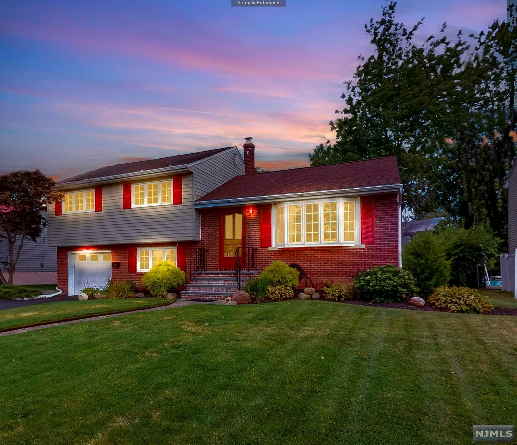You will feel at home immediately in an inviting interior that is awash with natural light & contains a flow-through living/dining area, generous living spaces & large windows. Fall in love with this gleaming meticulously remodeled kitchen, that boasts stainless-steel appliances & granite countertops. The comfortably sized main bedroom offers an ensuite renovated bathroom and a large closet. Enjoy resurfaced hardwood, a well-organized attached garage space, large basement and brand new roof (2021), heating/Central AC (2020), electrical throughout. The beautifully maintained outdoors offers a shady pergola, BBQ area & beautiful lawn w/ sprinkling system, simply ideal for entertaining. Ideally positioned in a relaxed section of suburban Bergen County. An easy commute, thanks to highways & many public transportation options to NYC within a short distance. Make good use of a spacious single car attached garage. This unique home won't last long. Call us today to arrange a showing!