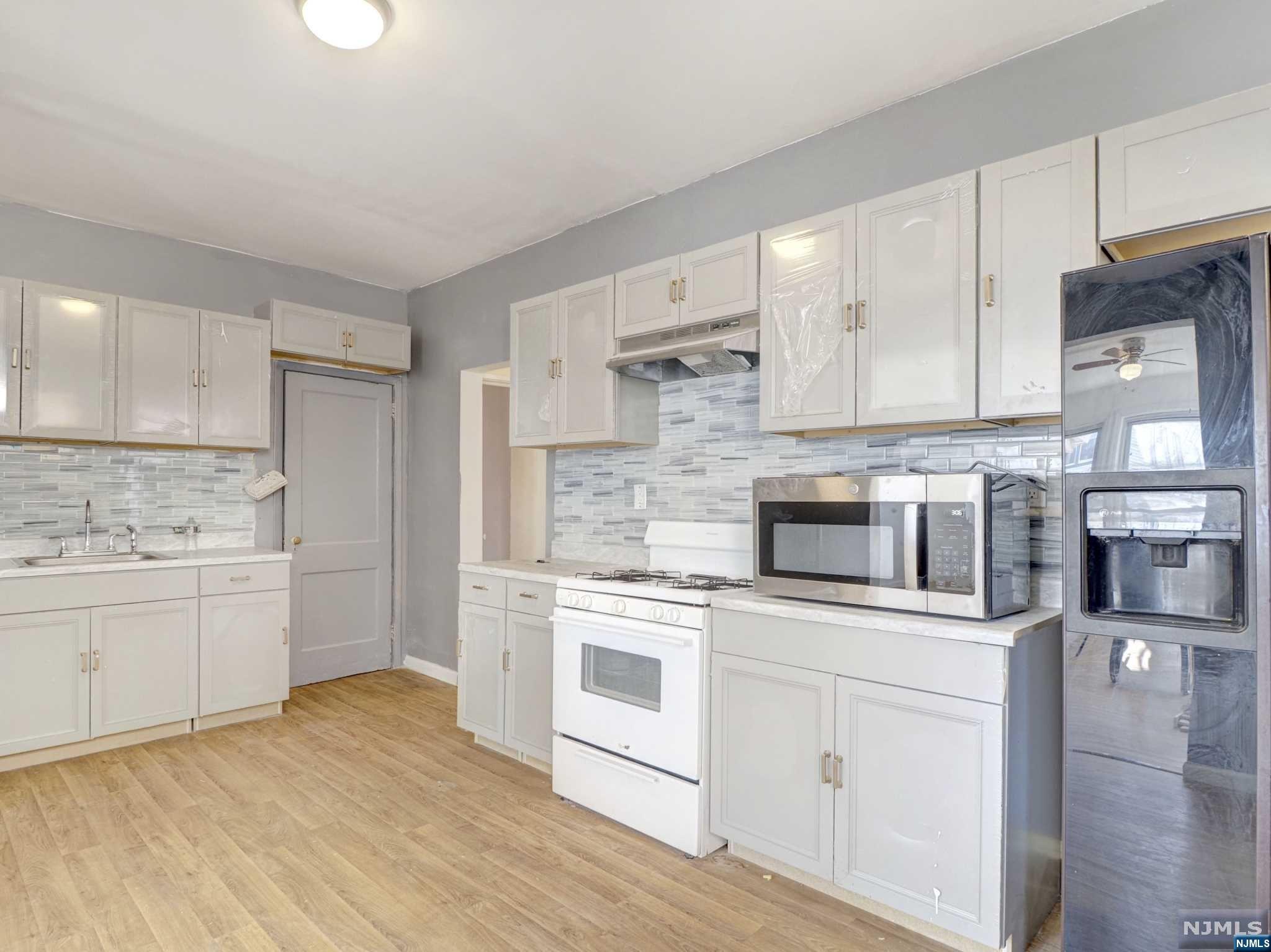 This charming property presents an incredible opportunity for both homeowners and investors alike. With its convenient location, ample parking, and versatile layout, this home is sure to exceed your expectations.Featuring a total of 3 bedrooms and 1 full bath in each unit, this property is perfect for those seeking comfortable and functional living spaces. The well-designed floor plan ensures maximum privacy and convenience for all occupants.A standout potential of this property is the unfinished basement with a separate walkout. This area presents endless possibilities for customization, allowing you to create a space that suits your unique needs. Whether you envision a home office, a workout area, or additional storage space, the unfinished basement provides the perfect canvas for your imagination.As you approach the property, you'll appreciate the private driveway that fits up to 4 cars, ensuring hassle-free parking for you and your guests.