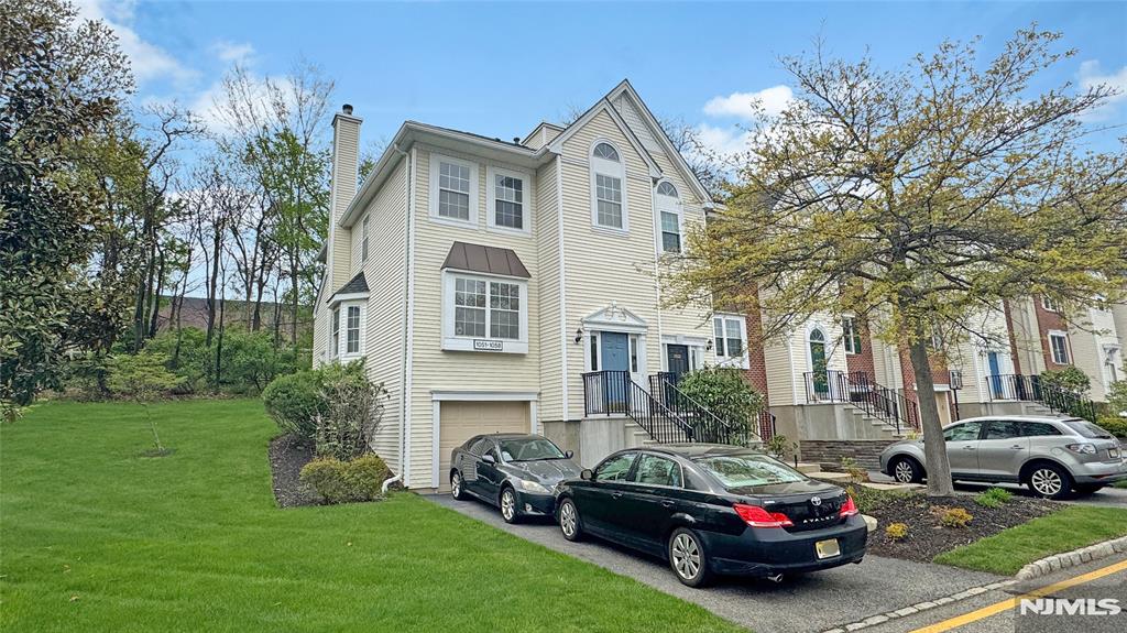 Beautifully maintained 3-bedroom, 2.5-bath end unit townhouse offering spacious living and a fantastic layout in a desirable Mahwah community. The main level features a sunfilled kitchen and dining area, an inviting living room with a fireplace and sliding doors leading to a private patio- perfect for outdoor relaxing and entertaining. The kitchen includes stainless steel appliances, ample cabinetry, and a sunny breakfast nook. Upstairs, youâ€™ll find generously sized bedrooms, including a large primary suite with abundant closet space and an en-suite bath featuring vaulted ceilings and natural light. Two additional bedrooms and a full bath complete the upper level. Additional highlights include a convenient powder room on the main floor, in-unit laundry, an attached garage, and driveway parking. Enjoy a peaceful setting with landscaped surroundings while being close to shopping, dining, parks, and major highways. A wonderful opportunity to own a spacious home in a sought-after location!