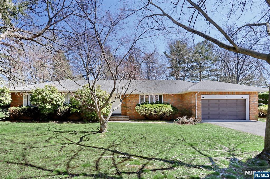 Modernized Ranch with Sunken Living Room & PRIVATE GATE to Van Saun Park! Experience a unique architectural layout on a 12,647 SQFT FLAT LOT (No Flood) in a quiet cul-de-sac. This meticulously maintained 4BR/3.5BA, 2,022 SQFT home with a FINISHED BASEMENT features a 2-CAR GARAGE and a rare PRIVATE GATE leading directly into the park, your own extended backyard! The main level offers a bright open flow. Enjoy a NEW KITCHEN (04/23) with a wall removed to overlook the stylish Sunken Living Room, a formal dining area, and 3 spacious bedrooms including 2 NEWLY RENOVATED BATHROOMS (07/24). The PRIVATE-ENTRY 1BR/1BA WING with kitchenette is ideal for guests, an in-law suite, or a home office. NEW ROOF (06/23) and NEW FENCE ALONG THE PARK SIDE (08/24). The property also features a massive layout offering endless possibilities, a perfect canvas to add your personal touch and custom finishes. Electric heating throughout is perfect for a future solar conversion (gas conversion also available). PRIME LOCATION: Walk to Middle/High Schools. Easy access to Rt 4, 17, GSP, Manhattan bus, and world-class shopping.