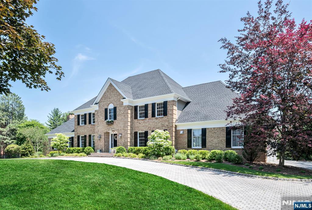Simply perfect! Located in Lily Pond Estates, Completely renovated inside and out to an extremely high standard. This classic and timeless center hall colonial offers high ceilings, new front door, new roof, new Trex deck, new paving stone patios surrounding the recently refinished Gunite pool, new landscaping and new fencing. The interior showcases all new baths, completely update kitchen, new appliances, Viking stove, new Viking refrigerator, new quartz counter tops, newly designed mud room, gleaming hardwood floors t/0, new porcelain floors in the foyer and kitchen. The family room with trayed ceiling offers all new moldings and fireplace surround plus a new wet bar with wine ref. and ice maker. The refinished lower level offers a recreation room with a new floor, gym with a new floor, cedar closet and storage. This home is conveniently located to shopping and the Indian Trail Club, complete with amenities . Enjoy Franklin Lakes award winning schools.