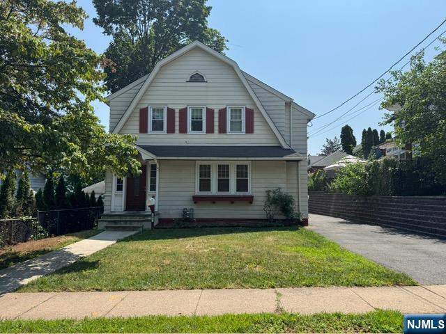 WELCOME TO THIS GREAT COLONIAL IN A VERY CONVENIENT LOCATION IN TOWN WITH EASY ACCESS TO PUBLIC TRANSPORTATION, HIGHWAYS, SHOPPING CENTER, SCHOOLS, AND PARKS. THIS HOME OFFERING FIRST FLOOR: LARGE ENTRANCE FOYER, LIVING ROOM, FORMAL DINING ROOM, UPDATED KITCHEN. 2ND FLOOR: 3 BEDROOMS WITH FULL BATH. FULL FINISHED BASEMENT WITH FAMILY ROOM, OFFICE, LAUNDRY, AND UTILITY ROOM. HARDWOOD FLOORS THROUGHOUT THE HOUSE, CENTRAL AIR, LARGE DRIVEWAY AND NICE ENTERTAINMENT YARD IN AN OVERSIZE LOT.