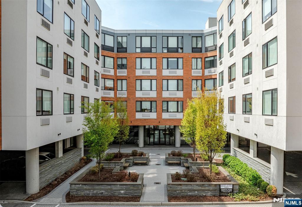**FIRST MONTH FREE on a 13-month lease + one parking space included! - for occupancy commencing on or before 7/1/26!** Welcome to the Metro, Fort Lee's newest luxury building. All amenities INCLUDED in the rent, and REDUCED rent security offered to qualified applicants - The Metro features a variety of upscale, spacious floorplans. high-end residences fully equipped w/ modern kitchens w/ stainless steel appliances, quartz countertops, full islands & tiled backsplashes, open living/dining areas, shades on all windows, modern bathrooms & a full-sized washer & dryer in each unit. The Metro features a large elegant lobby, outdoor courtyard, outdoor terrace/garden, large club room and a on-site fitness center, which includes the Echelon Reflect mirror, electric car charging stations & INDOOR (covered) parking garage w/ direct elevator access to all residences for uncompromising security. Pet friendly (LB limit & fees apply)! Tenants pay ALL utilities! PARKING: 1st space INCLUDED IN THE RENT(!); Additional space - $150/monthly! Virtual tour available upon request!