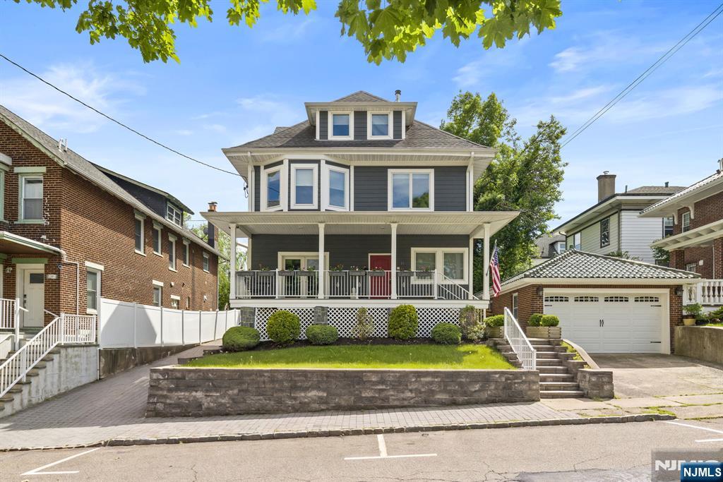 In a market where you usually have to compromise, this home gives you everything. This exceptional two-family residence is tucked into one of North Bergenâ€™s best neighborhoods, just one block from North Hudson Park and moments from Boulevard Eastâ€”giving you the perfect mix of peace and easy city access. Fully renovated in 2018, this 5,000-square-foot home is built for both daily living and effortless hosting. The layout is split into a massive ownerâ€™s triplex. On the first level, youâ€™ll find 1,200 square feet of wide-open living and dining space centered around a chef-level kitchen. The whole area opens to a big backyard, making it easy to grill, entertain, or let pets run around. This floor also includes a full bath and a separate mudroom entrance. Up on the second floor are three good-sized bedrooms and two full baths, including a junior suite. This level also features a wet bar leading to a massive, 600-square-foot private deck with beautiful sights of the Manhattan skyline. The top floor is dedicated entirely to a private owner's suite spanning over 800 square feet, complete with a sitting area, three custom walk-in closets, a spa-like bath, and a private terrace with direct NYC views. The second unit is a two-bedroom, two-bath apartment with its own entranceâ€”perfect for rental income, guests, or a home office. Features include 4-zone HVAC, central vacuum, a gas fireplace, a wood stove, and rare 4-car parking. Seller is a licensed real estate broker.