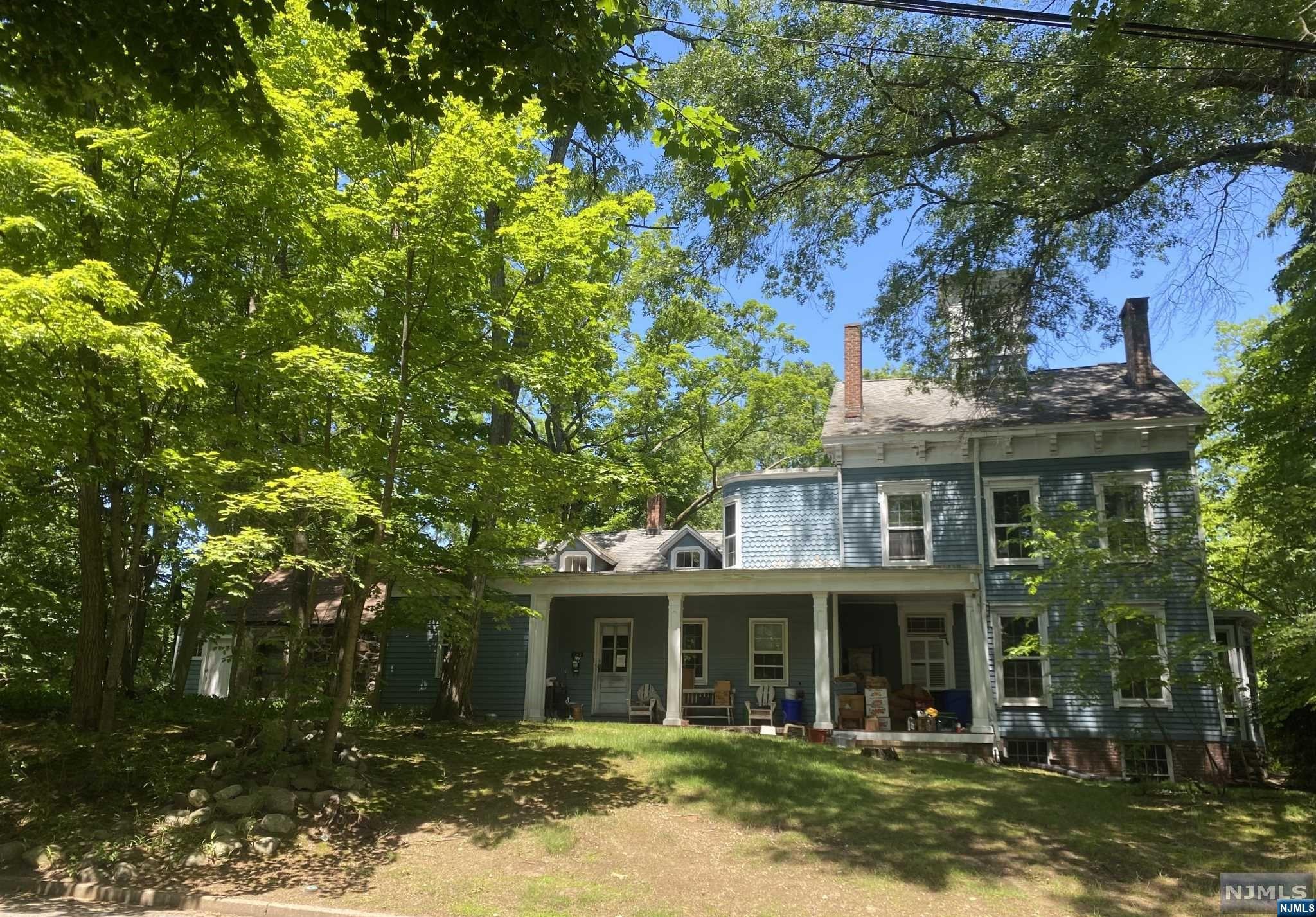 This large and interesting mid 1700's vintage Mahwah home is ready for your many updates. So many historic features including Lots of beautiful moldings, multiple fireplaces, a Beehive oven and a smoke house. This spacious home is being sold in AS IS condition but offers so many interesting rooms and multiple fireplaces. In the attic you will find a staircase to the cupola. Old world charm at its finest. It sits on an oversized lot for the area on a lovely street with good value. Walk to town and the train station to NYC. Town with great schools and many parks with mountain hiking trails.