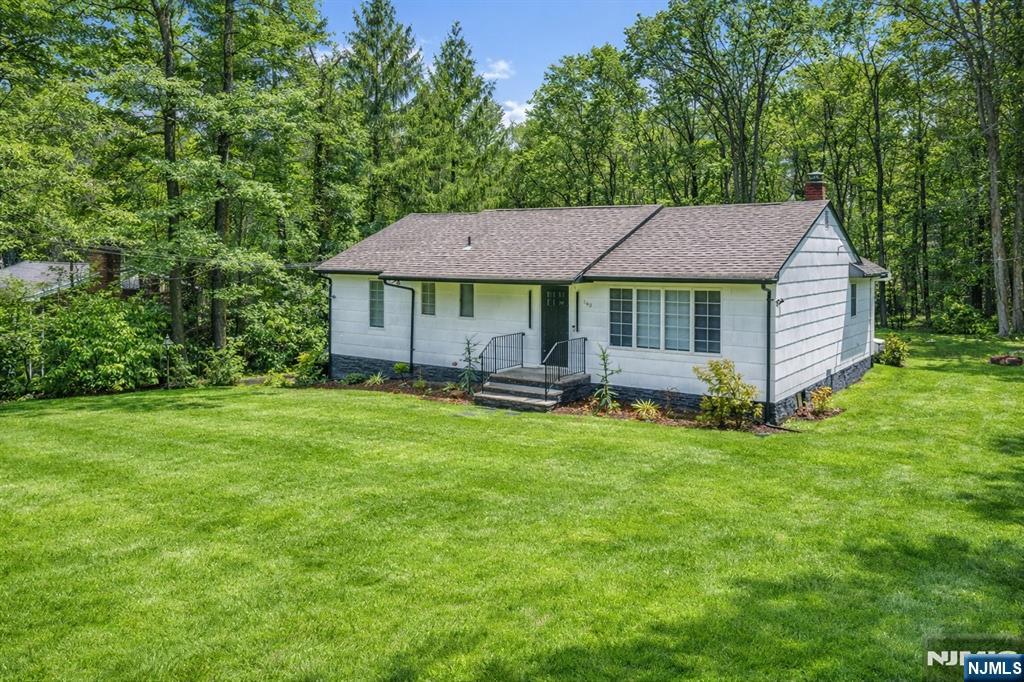 Welcome to this fully renovated 3-bedroom, 2-bath ranch, perfectly situated in the desirable Newfoundland section of West Milford. This home has been completely updated from top to bottom, offering modern finishes and move-in-ready convenience.Step inside to a bright and inviting layout featuring a spacious living room and formal dining room, ideal for both everyday living and entertaining. The beautifully renovated kitchen boasts updated cabinetry, countertops, and appliances, making it the heart of the home.The main level includes a primary suite with a private full bath, along with two additional bedrooms and a second full bathroom, all thoughtfully updated.The finished basement provides even more living space with a large recreation room perfect for a home theater, gym, or play area plus additional storage and flexible use space.Situated on an oversized lot of over 20,000 square feet, the property offers plenty of room for outdoor enjoyment, gardening, or future expansion.Don't miss this opportunity to own a fully updated home in a peaceful, sought-after location!