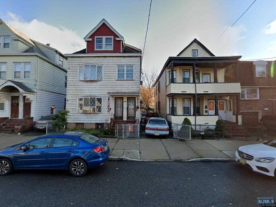 Great 2 family property! Recently upgraded 200 amp service. Property needs to be rehabbed. Full basement, walk through attic. Driveway can accommodate 4+ vehicles. Great potential.
