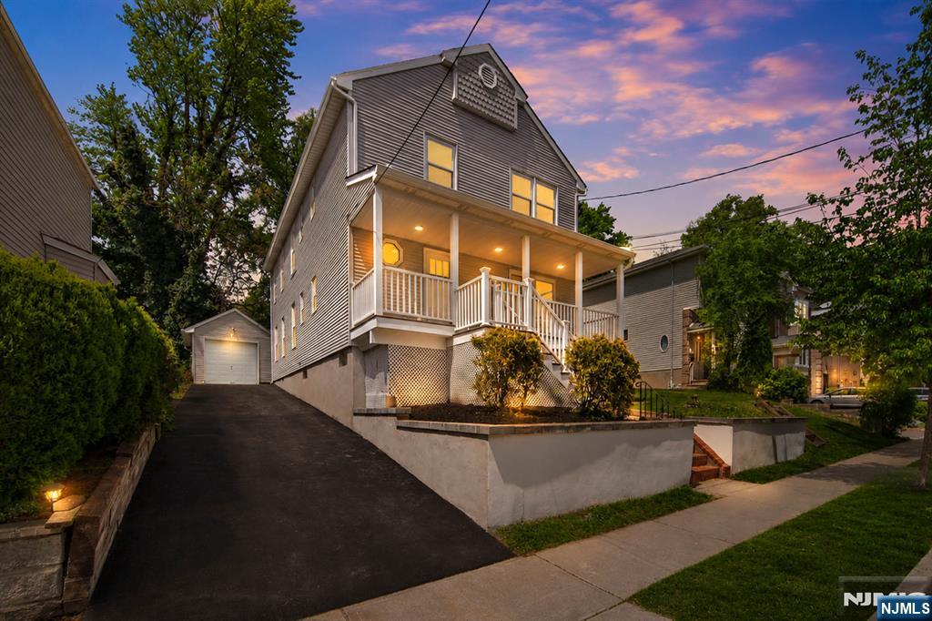 Newly renovated two-family home in a convenient East Rutherford location. This vacant, move-in-ready property has undergone a major renovation, with nearly everything updated, including both kitchens, all bathrooms, flooring, windows, roof, and more. The first-floor unit offers 2 bedrooms, 2 full bathrooms, a living room, dining room, and kitchen, plus direct use of the lower level featuring a recreation room, half bathroom, and laundry room. The second-floor unit offers 3 bedrooms, 2 full bathrooms, a living room, kitchen, and its own laundry room. Both units are vacant, providing flexibility for owner-occupants, extended household use, or investment purposes. Additional features include a fenced-in yard, detached 1-car garage, and a long single-file driveway for additional off-street parking. Approximate lot size is 7,501 sq. ft. based on public records. A comprehensive virtual tour is available, showcasing a video walkthrough, an interactive 3D model, and a detailed floor plan. https://newjerseyproper.com/195-van-winkle-st-east-rutherford-nj/