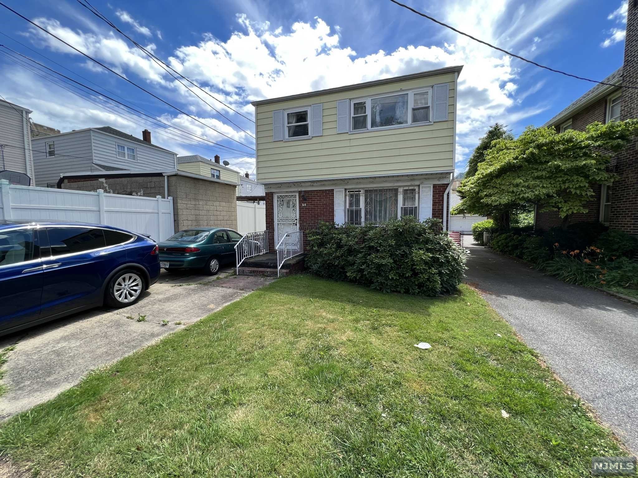 MULTIPLE OFFERS / DEADLINE TUESDAY 8/23 @ 12 PM. Location! Location! Location! Move in ready or customize to suite your own taste. Close to schools, university, houses of worship, 1/2 block from bus to Journal Square providing easy access to NYC by Path train, all while still being on a relatively calm residential street. Colonial style living w/ 3 well sized Bedrooms, 1 Full Bath, 2 Half Baths, Rec area in the basement. Large backyard w/ covered back porch, a large storage room and 1 car detached garage plus room for 6 more cars in the driveway. Works for owner occupant or as a rental property. Sold strictly AS-IS. Furniture negotiable.