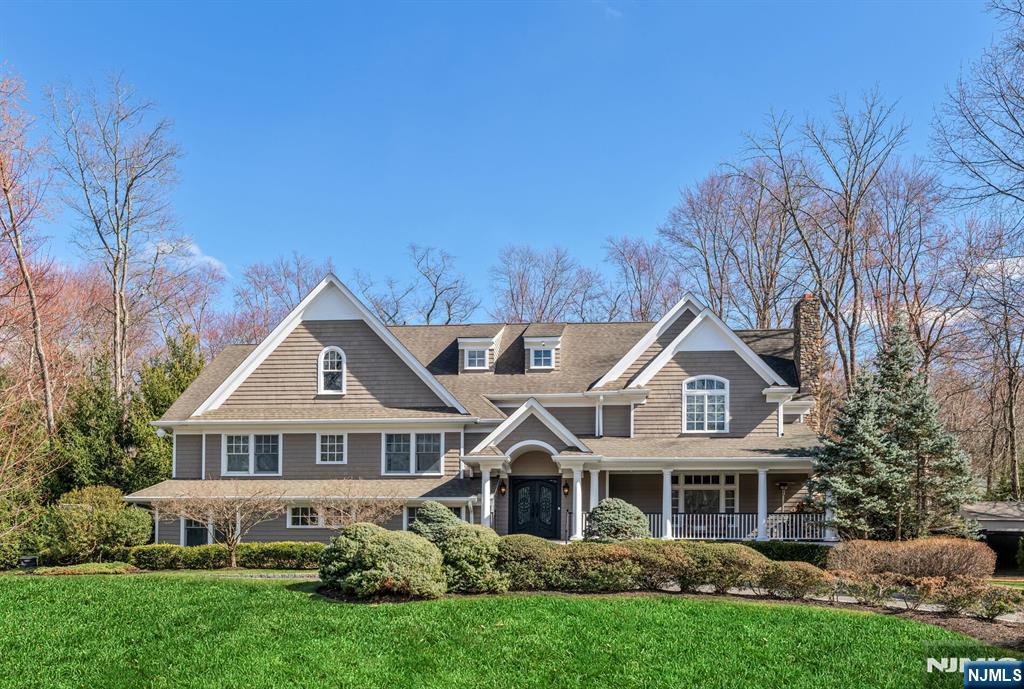 Magnificent custom-built ~6,000 sq. ft. Colonial on a flat acre at the end of a rare double cul-de-sac in one of the most coveted Ho-Ho-Kus neighborhoods. This 5-bedroom, 5.5-bath residence is designed for todayâ€™s lifestyle, offering scale, privacy, and sophistication rarely available in town. The main level features a gracious foyer, powder room, living room with bar and fireplace, banquet dining room, and an expansive gourmet eat-in kitchen with large island, walk-in pantry, and top-tier appliances, all with an effortless flow for hosting. A first-floor wing with its own playroom/guest bedroom, full bath, den, mudroom, wet bar, direct access from the oversized three-car garage, and an expansive great room with soaring vaulted ceilings and fireplace creates an ideal setup for multi-generational living or guests. Upstairs, a generous primary suite offers a tray-ceiling bedroom, separate library, dedicated home office, and two walk-in closets with spa bath. Three additional ensuite bedrooms feature excellent closet space, including two with walk-in closets, plus a convenient laundry room. The finished lower level provides flexible recreation space, gym, and full bath. Outside, a newly fenced, resort-like backyard showcases a free-form Gunite pool, expansive patio, and lawn perfect for summer gatherings. This is a rare opportunity to enjoy a move-in-ready home in Ho-Ho-Kus, offering top-rated schools, a vibrant downtown, and convenient NYC transportation.