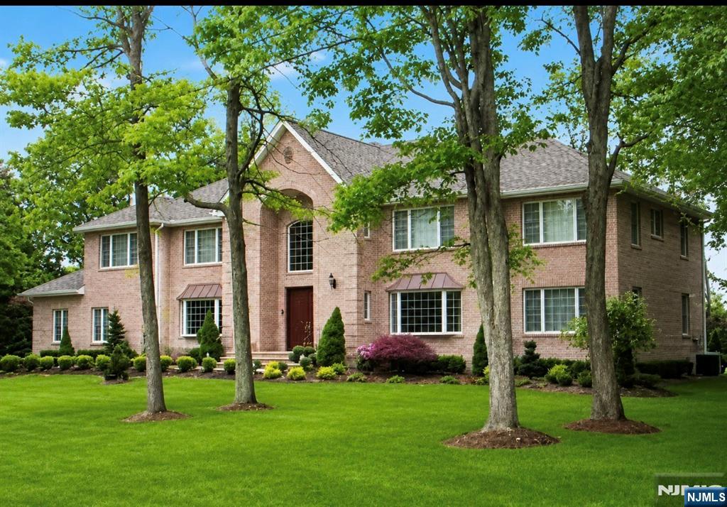 Elegant custom estate nestled on approximately 0.92 acre in prestigious Franklin Lakes. This beautifully maintained center hall colonial offers approximately 4,800+ SF of luxurious living space featuring 4 bedrooms, 5.5 baths, spacious guest accommodations, and a fully finished basement. Grand living areas, timeless architectural details, and abundant natural light create an exceptional atmosphere throughout. Enjoy the convenience of a 3-car garage, expansive driveway, and beautifully landscaped grounds offering both privacy and sophistication. A rare opportunity to own an impressive luxury residence in one of Bergen Countyâ€™s most desirable communities.