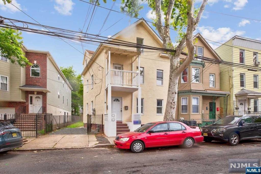 Back on Market! Splendid 2-family house with classic charm and a well-maintained facade. It also features a long 1 car-width driveway that can fit up to 5 cars. The interior boasts large windows for natural lighting. Unit 1 has 2br, 1ba, Kitchen and Living Room. Oh the other hand Unit 2 has 4br, 2ba, Kitchen and Dining Room. Each unit has an updated kitchen with sleek stainless steel appliances and wooden cabinets. Its huge backyard is prefect for any activity. Conveniently located near shops, schools, parks, transportation. Great investment property! Schedule showing and send offers asap!