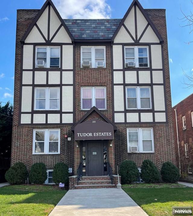 Very nice and spacious apartment located on 3rd floor in Tudor Estates. Building is convenient to NYC Bus and train station, close to Rt 3 and Rt 17. Unit features large Eat-in-Kitchen, good size living room, 1 Bedroom, full bath, high ceilings and hardwood floors. There is additional storage in the basement, coin operated Washer/Dryer and charming shared patio/yard.
