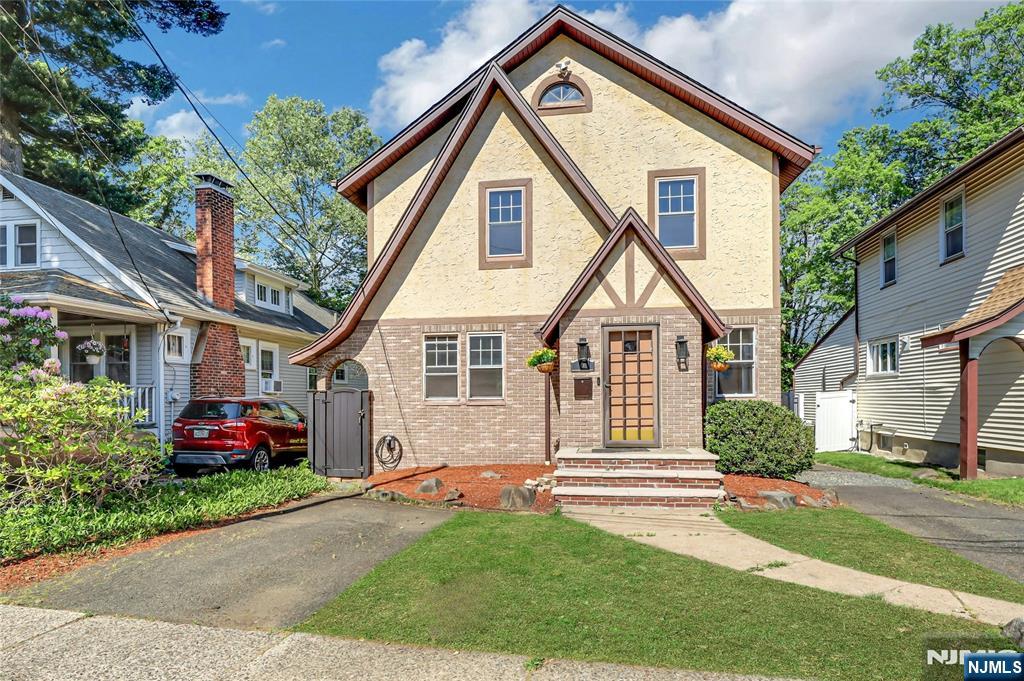 Charming 3-BR Home with Beautiful In-Ground Pool in Dumont! Step into this lovely home filled with charm and gleaming hardwood floors throughout! The bright and large living room flows seamlessly into the spacious dining roomâ€”perfect for entertaining guests. The updated eat-in kitchen features wood cabinetry and stainless steel appliances. A stunning all-season room with a wall of windows overlooking the backyard, along with a convenient powder room, completes the main level. Upstairs, youâ€™ll find three generously sized bedrooms and a modern full bath. The lower level offers a large recreation room, laundry area, and plenty of storage space. Outside, enjoy the lush fenced-in backyard featuring a heated in-ground pool, beautiful paver patio, and an additional bonus shedâ€”perfect for a future pool house, cabana, or extra storage. Donâ€™t miss the opportunity to own this beautiful home with the perfect backyard oasis!