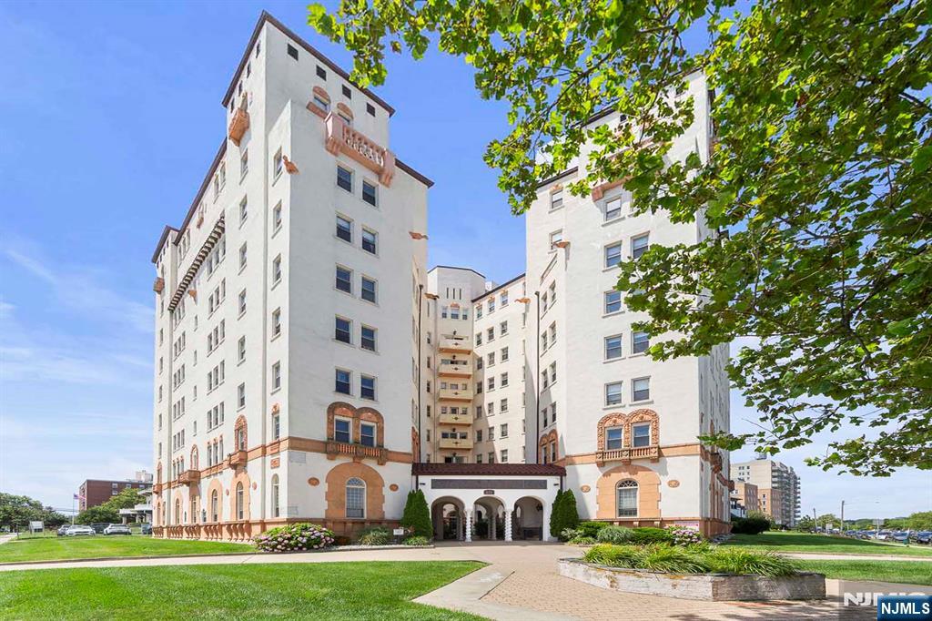 Welcome to this rental opportunity in historic Santander. This charming Spanish-style building features grand foyers and an inviting courtyard with gardens and a fountain, located just three blocks from the beach, boardwalk, and ocean in Asbury Park. This corner unit offers one bedroom and one full bathroom with direct views of Deal Lake and the Atlantic Ocean. The unit has hardwood floors, 9-foot ceilings, and beautiful lake or ocean views from every window. The building offers on-site laundry, a convenient bike rack, and secure controlled access. Enjoy the vibrant Asbury Park lifestyle with close proximity to restaurants, unique shops, the arts scene, live entertainment venues, and the iconic Asbury Park Convention Hall.