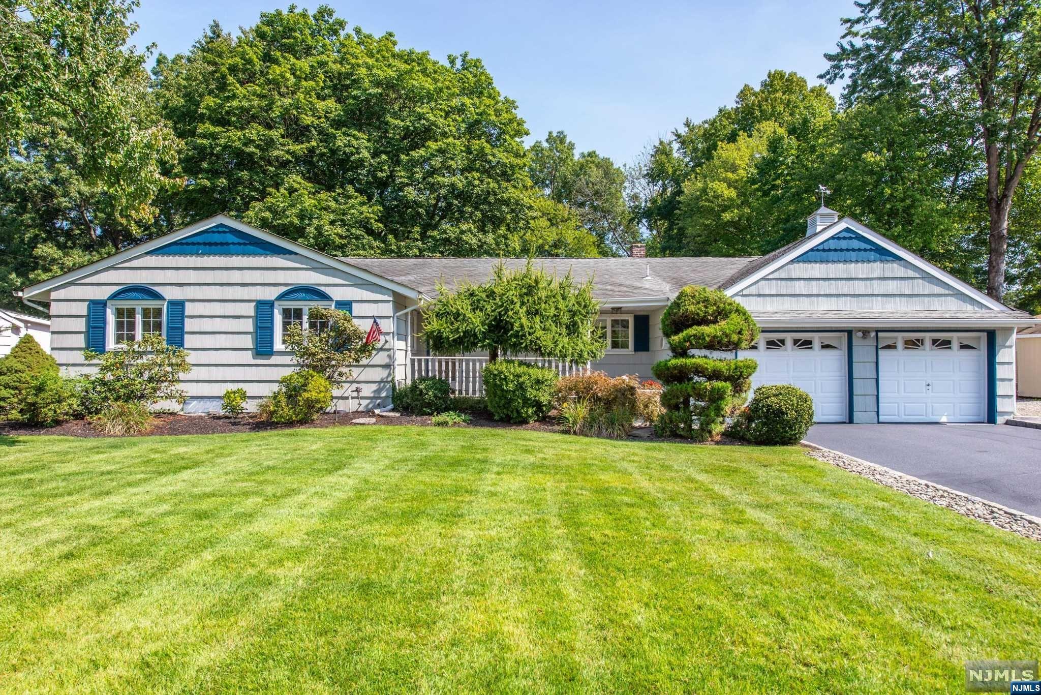 Who doesn't love a Ranch?! There's sure a lot to love about this move-in ready Ranch! Easy One Floor Living & Cheerful exterior overflowing with curb appeal. Welcoming front porch perfect for morning coffee or afternoon tea! No shortage of space for hosting - large open concept eat in kitchen featuring center island with bar stool seating plus formal dining room! Kitchen is open to the spectacular great room w/ soaring ceilings, large windows & gas fireplace. Open the sliders and say hello to your fabulous outdoor lifestyle complete with Deck, Paver Patio & Gorgeous Pool - what more could you want?! Versatile layout with 3 bedrooms plus an option for 4th bedroom or family room with slider to paver patio & rear yard. Highlights include: shed, newly sealed driveway, 4 zone NAVIAN Heat & Water system, Central AC, 2 car garage, underground sprinklers...come see for yourself!