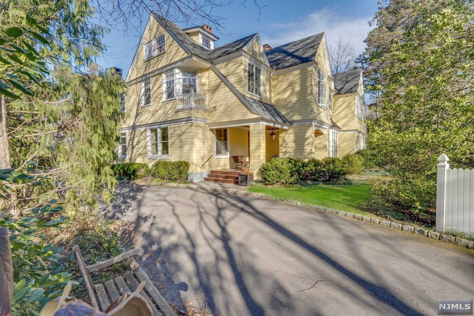 Stunning Private Gated Estate in prime location, on East Hill of Englewood. Just 8 miles from NYC, brings you to your beautifully landscaped enclave. The Mahogany porch leads to a Magnificent Center Hall Colonial. Attention to every detail is clear upon entry. Mouldings, hardwood floors, european tile with both formal and casual entertaining rooms. Natural light floods this home, with large windows and skylights throughout. 7 Bedrooms, and 6.1 bathrooms, and .9 of an acre, make this a home, where memories will be made. The kitchen and Butler's Pantry have luxury Viking appliances and hand painted enamel sinks. Family Room, is warm, inviting and filled with natural light. This home is meticulously maintained, and truly unique. Conveniently located being in walking distance to Houses of Worship,and Englewood's sophisticated town center. This a home not to be missed.