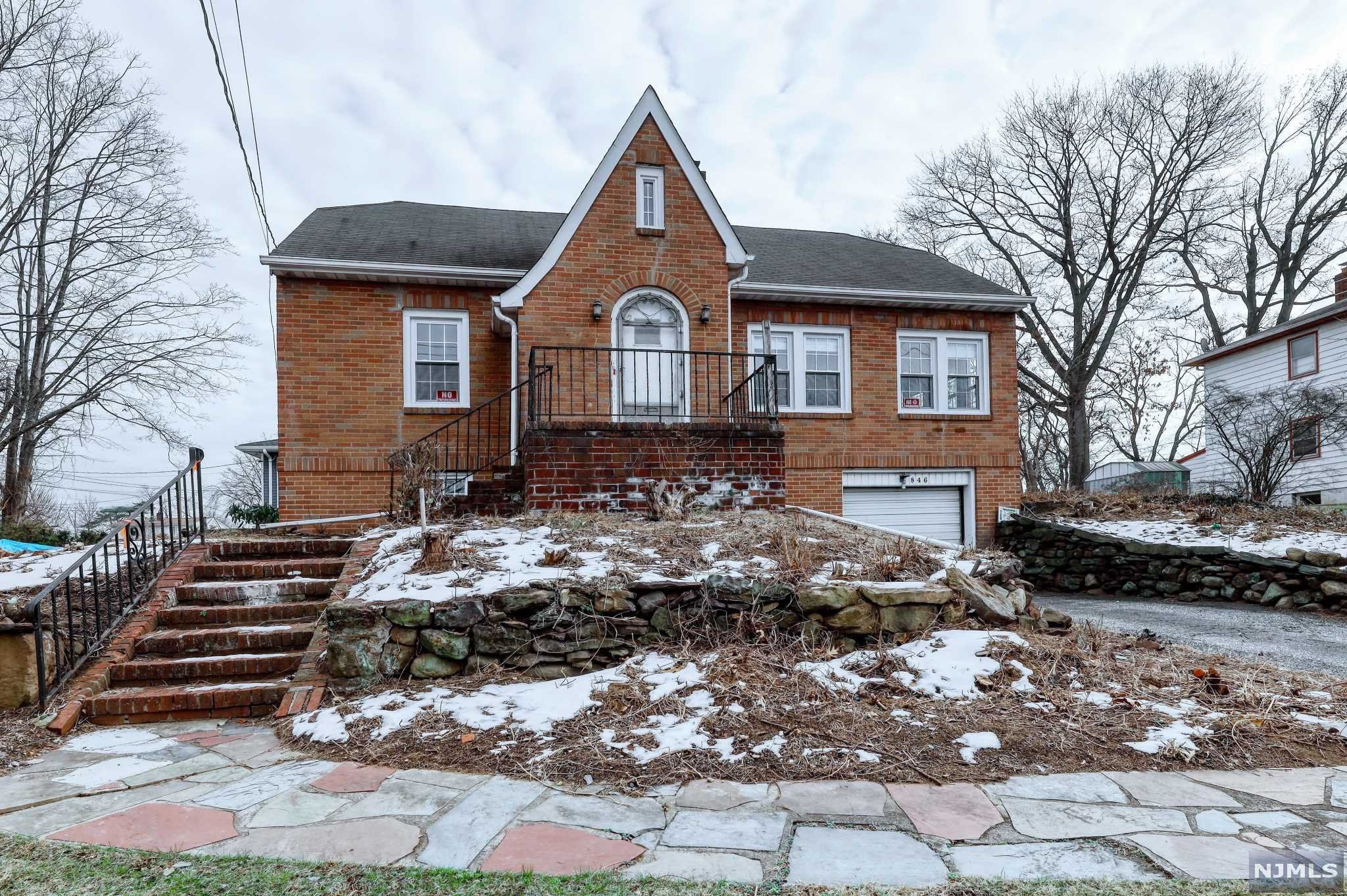 THIS AMAZING HOME WITH ENDLESS POSSIBILITIES IS SITUATED ON AN OVERSIZED 130'X100' LOT IN THE DESIRABLE MAYWOOD TOWNSHIP. LOT COULD POSSIBLY BE SUBDIVIDED INTO TWO CONFORMING LOTS. THIS HOME FEATURES HIGH CEILING ON THE FIRST FLOOR, LARGE EAT-IN KITCHEN, LARGE LIVING ROOM/FIREPLACE. THE SECOND FLOOR FEATURES TWO LARGE BEDROOMS. LARGE GARAGE, TWO DRIVEWAYS, BRICK EXTERIOR. WALK TO SCHOOLS, NYC BUS, PARKS, BERGEN MALL & MAYWOOD'S FAMOUS DOWNTOWN SHOPPING STREET. OWNER HAS AN INSURANCE/OIL TANK PROTECTION PLAN ON THE UNDERGROUND OIL TANK.