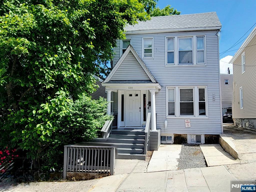 Welcome to this beautifully renovated three-bedroom apartment located in a well-maintained two-family home. Thoughtfully updated, this residence features a spacious eat-in kitchen equipped with stainless steel appliances, modern cabinetry, and ample counter space. The tastefully updated bathroom offers a fresh, clean aesthetic, while the rare bonus of an in-unit washer/dryer combo adds everyday convenience. A dedicated parking spot is includedâ€”an absolute must-have in this area! Situated just minutes from NYC, this home offers quick access to major highways, public transportation, and an array of local shops, restaurants, and parks.