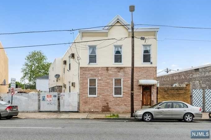 DOUBLE LOT. 2-family house. 1st fl has 1 bed/1 full bath, kitchen & living room. Hardwood throughout. 2nd floor newly renovated - 6 rooms total - 3 bedrooms/2 full baths, living room, dining room, breakfast bar, Primary bedroom with en-suite bathroom, plenty of closets, new roof with a 30-year warranty, patio with surround sound system and plenty of parking with a 15 car driveway. Shed and snowplow included in the sale. Oil heat. One boiler for entire house which has been serviced yearly. Separate utility meters. Camera security system is included as well. Being sold AS-IS. House number is 35 because Bloomfield Township has renumbered the houses.