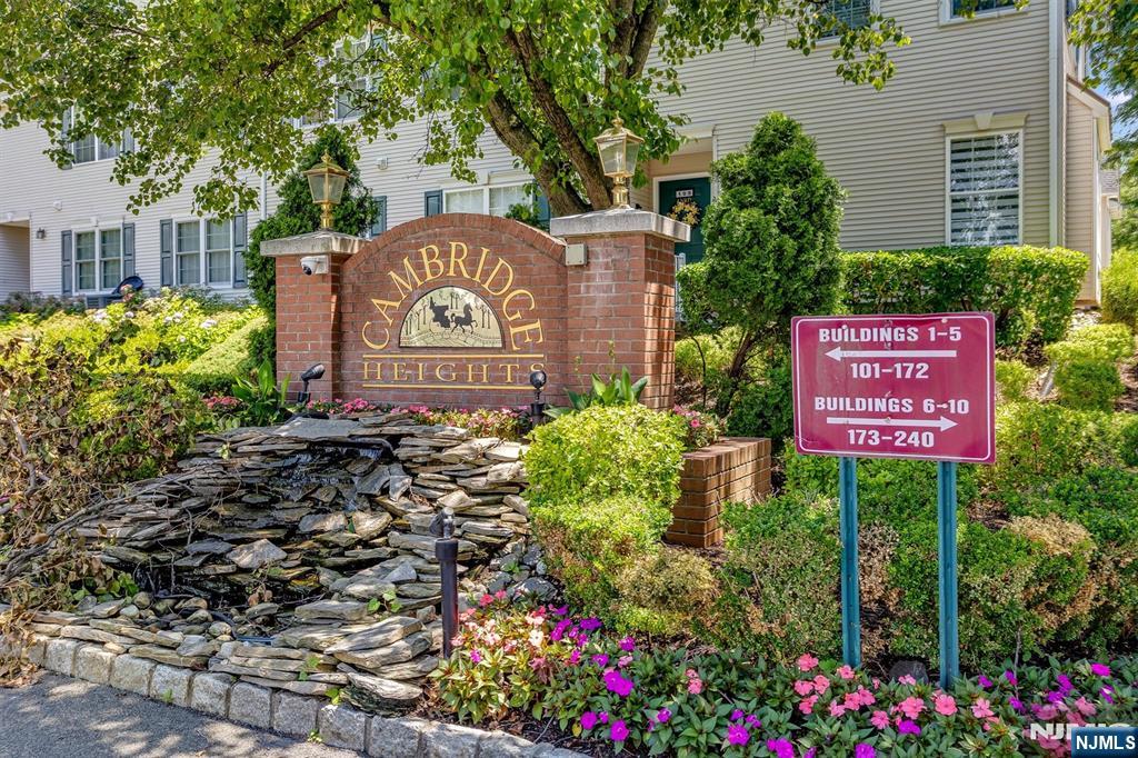 Discover the perfect blend of comfort and convenience in this bright two-bedroom, two-full-bath unit with a loft. Tucked away in a private gated Clifton community, this residence offers a low-maintenance lifestyle where the association handles snow removal, outdoor upkeep, garbage, enjoy the community pool and fitness center. The main level offers hardwood floors and an open kitchen equipped with stainless steel appliances and a breakfast bar perfect for a quick morning coffee. Step through the sliding glass doors onto your balcony with a view of the pool. With an in-unit washer and dryer plus assigned 2 car parking. Newer furnace and hot water heater. Excellent location ideal for those who need quick access to NYC transportation, you're also just moments away from a variety of local shopping and dining options. Why rent when you can own a home that offers this much value and style?