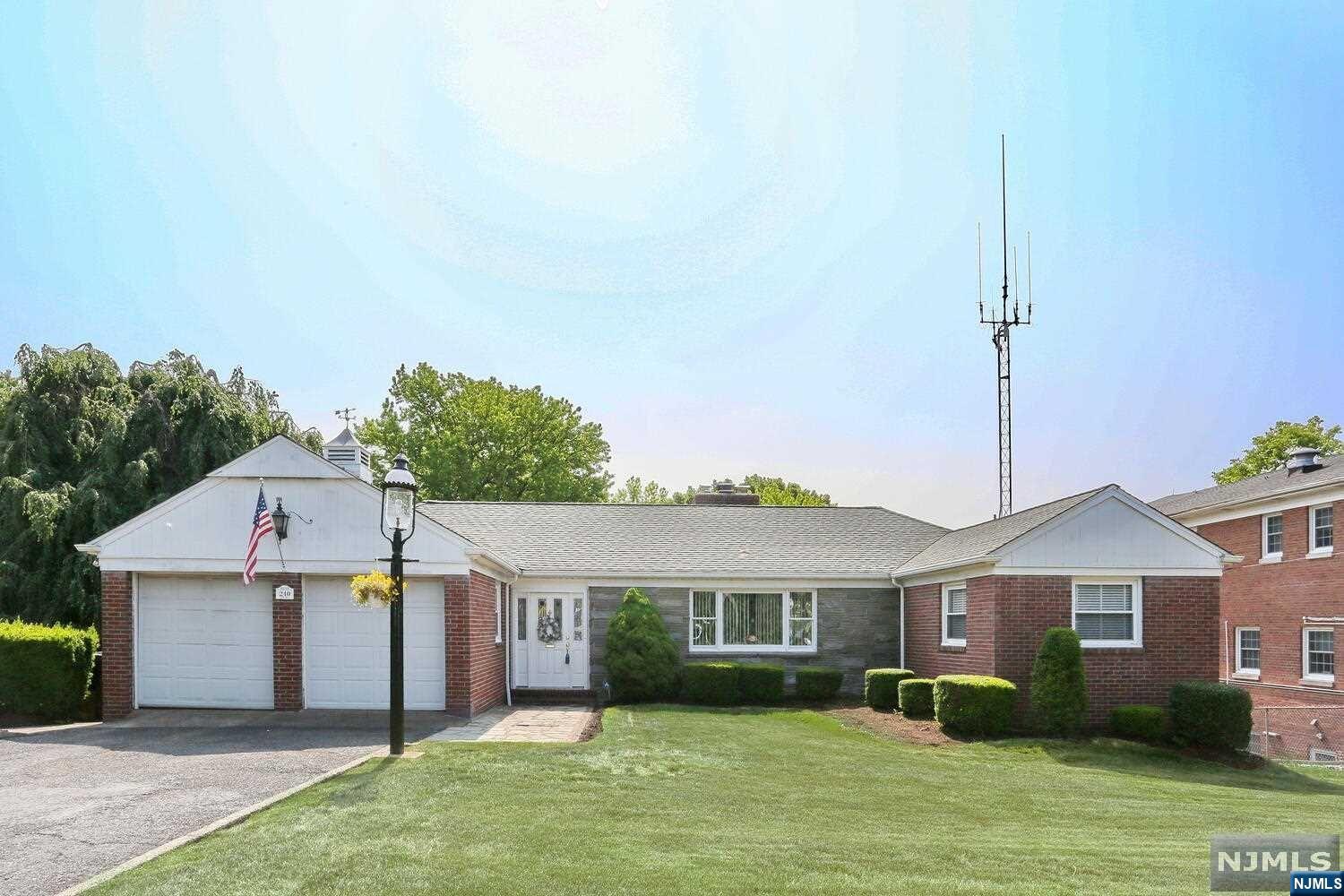 What a Great Opportunity to Own This Custom Built One of a Kind Brick Ranch Home in Desirable Paramus on Large (.62 Acre) Lot...Perfect for Downsizing, Expanding or Re Building...The Main Level Offers an Oversized Living Room Ideal for Entertaining with Slate Stone Fireplace and Large Newer Picture Window...The Unique Stone Fireplace is Flanked by French Doors That Lead to a Terrace with Amazing Views of the Parklike Setting and a Large Stone Grill...There's a Nice Size Kitchen, a King Size Primary BR with 2 Closets and Another BR and Full Bath. The Lower Level with Access to Backyard Features Steel Beam Construction,Family Room (in Need of Flooring) with Additional Stone FirePlace, Office and a Half Bath And Access to Ground Level Patio...This Very Special Home Offers Hardwood Floors (under carpet) a Weil McLean Gas Furnace, CAC, Copper Plumbing, 2 Car Garage, Pull Down Stairs For Attic Storage, IG Sprinklers (As Is) and So Much More...Don't Miss It!