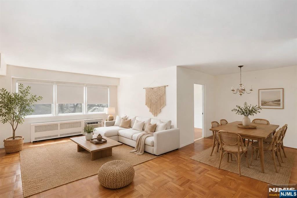 Beautifully maintained condo in the heart of Montclair, just moments from downtown and just over 1 mile to the train. Inside, wood floors flow seamlessly throughout, leading to an oversized living room with plenty of space to relax or entertain. A defined dining area connects easily to the upgraded kitchen, featuring stone countertops, rich cherry cabinetry, stainless steel appliances, and exceptional storage. Both bedrooms are generously sized with ample closet space throughout. Additional highlights include a heated garage with assigned parking space, elevator building convenience, and a bus stop right across the street for easy commuting. Monthly maintenance includes heat, water, and sewer. Pet-friendly complex with additional storage and laundry located in the basement. All just minutes to shops, restaurants, and NYC transportation.
